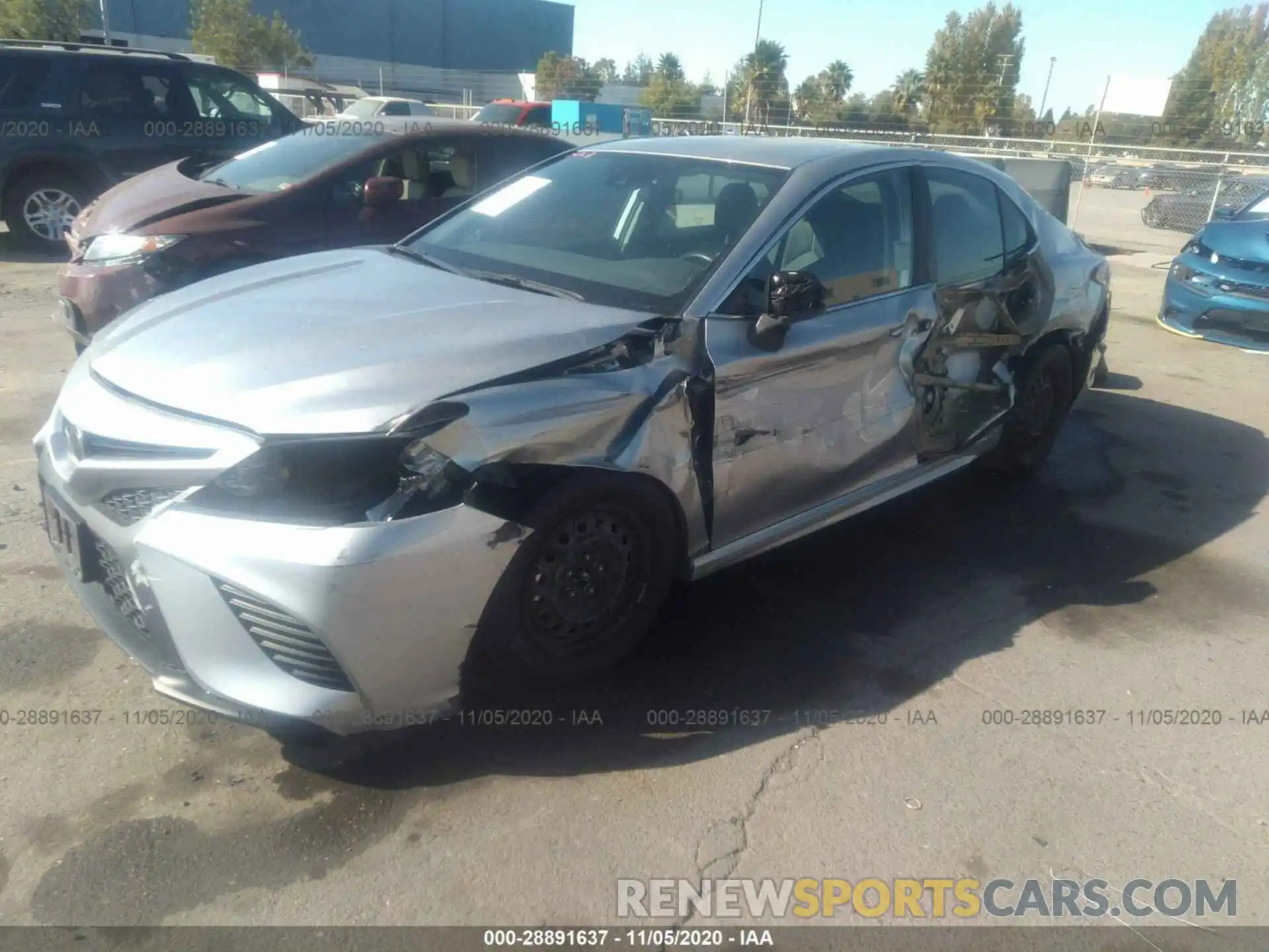 2 Photograph of a damaged car 4T1B11HK1KU213998 TOYOTA CAMRY 2019