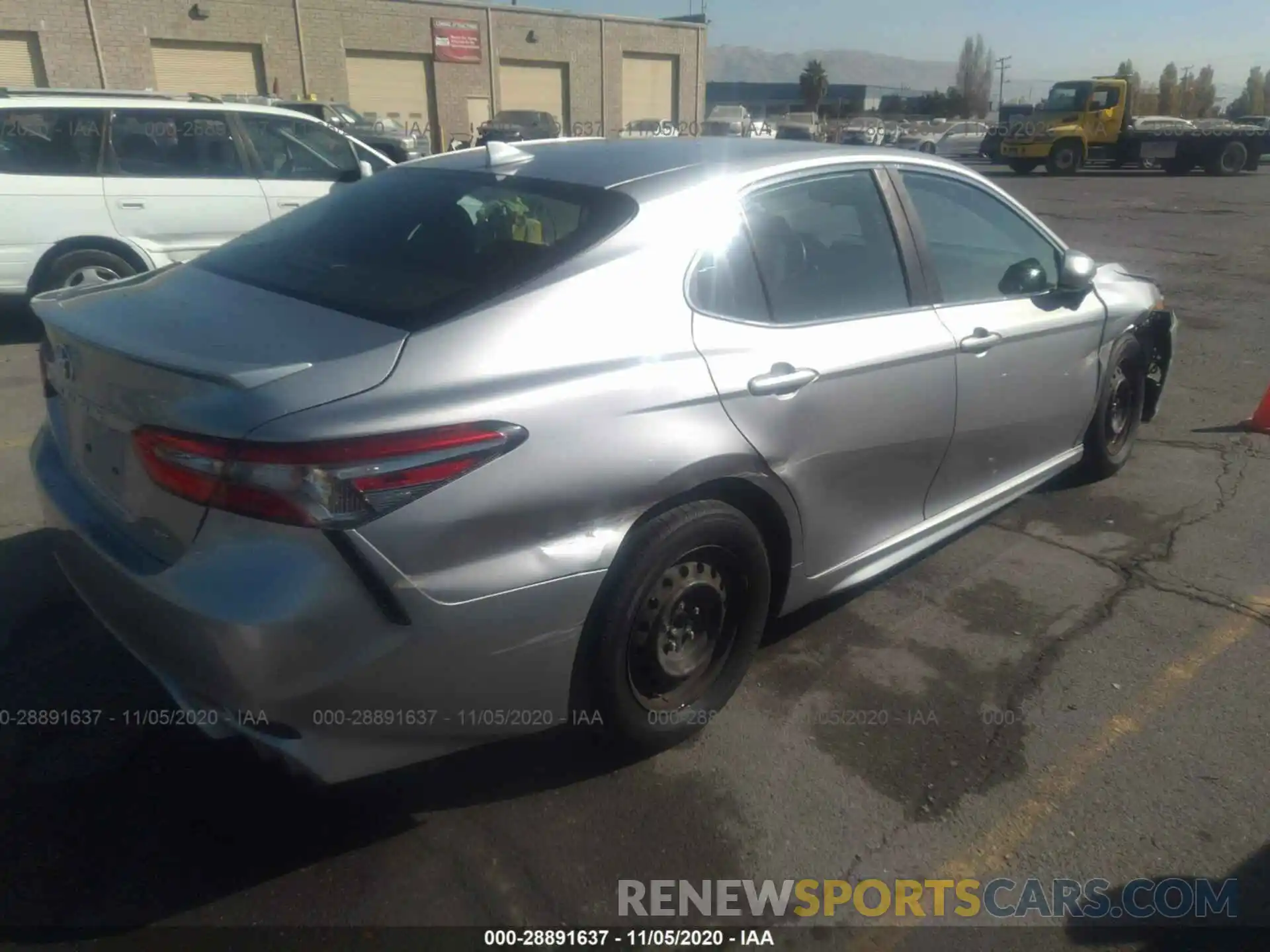 4 Photograph of a damaged car 4T1B11HK1KU213998 TOYOTA CAMRY 2019