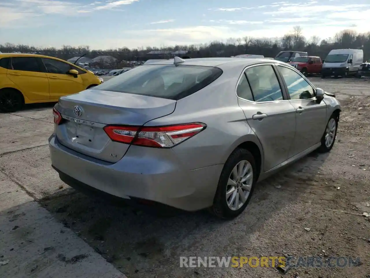 4 Photograph of a damaged car 4T1B11HK1KU214682 TOYOTA CAMRY 2019