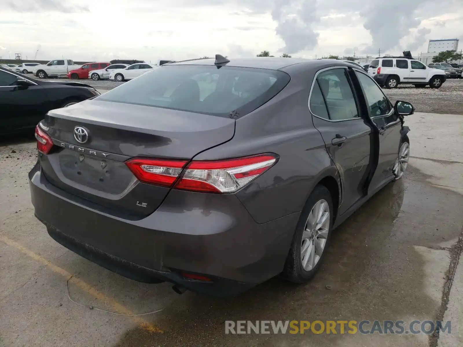 4 Photograph of a damaged car 4T1B11HK1KU215573 TOYOTA CAMRY 2019