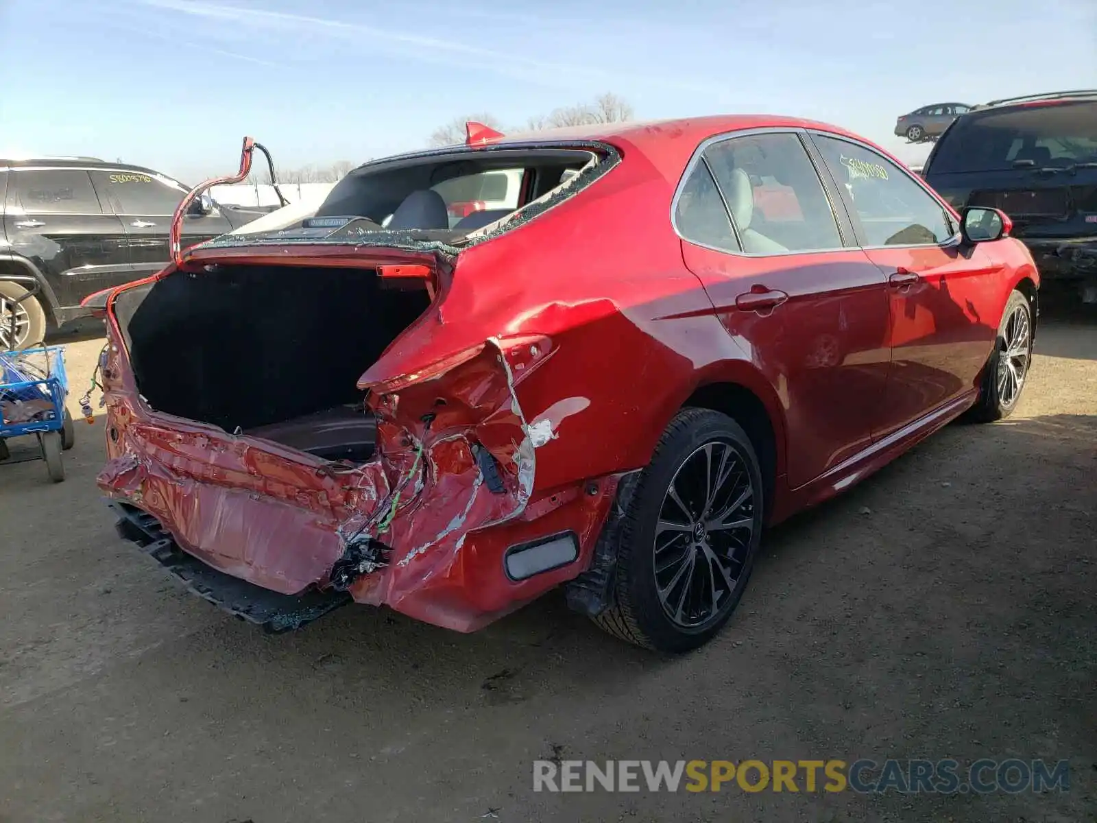 4 Photograph of a damaged car 4T1B11HK1KU215749 TOYOTA CAMRY 2019