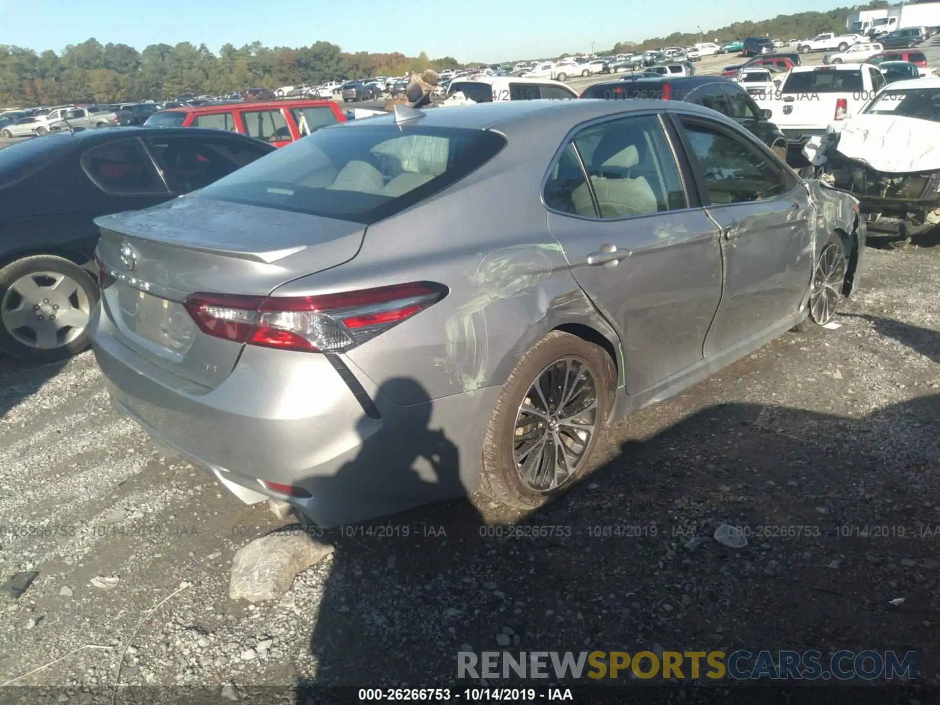 4 Photograph of a damaged car 4T1B11HK1KU215881 TOYOTA CAMRY 2019