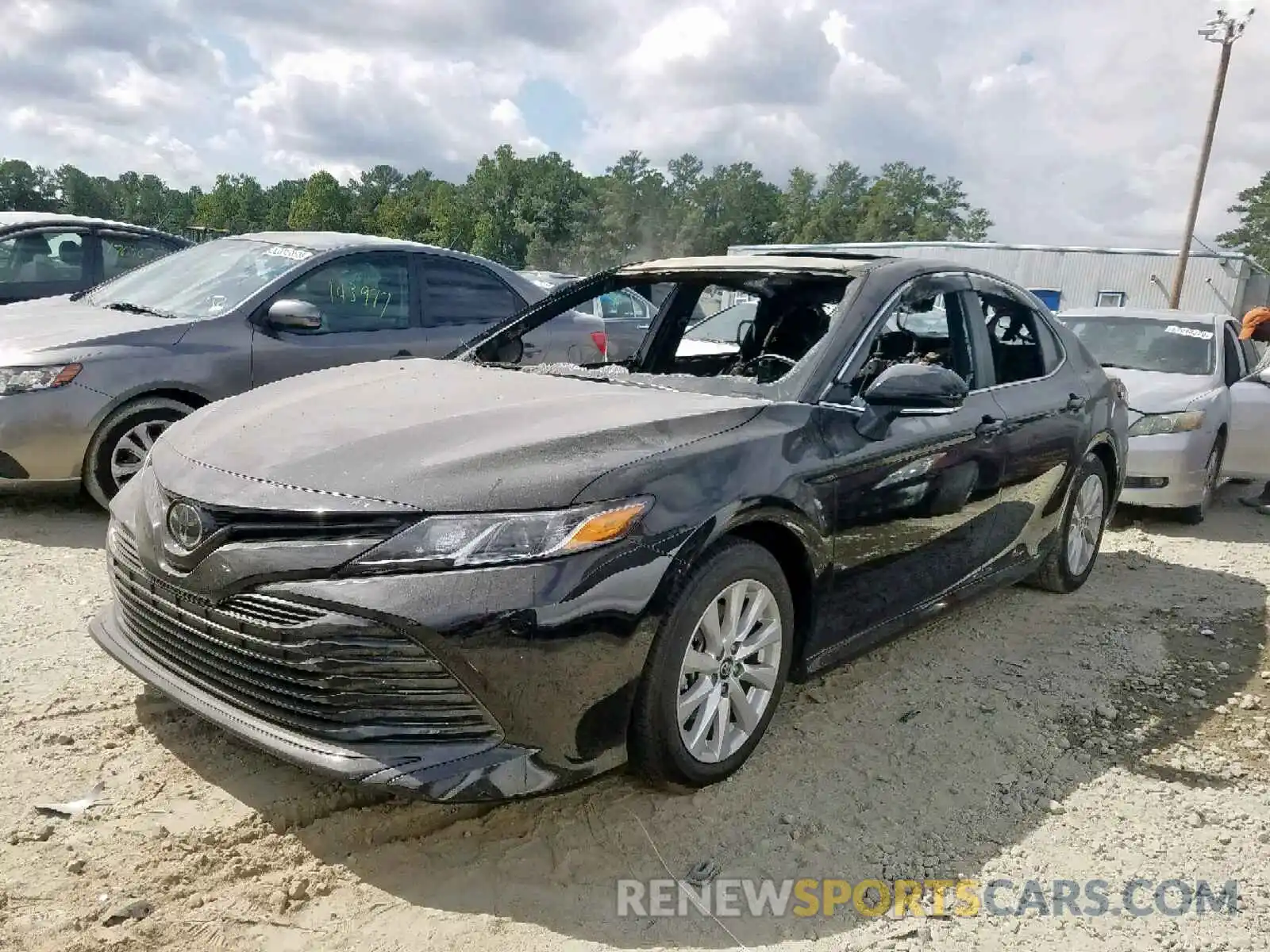 2 Photograph of a damaged car 4T1B11HK1KU216495 TOYOTA CAMRY 2019