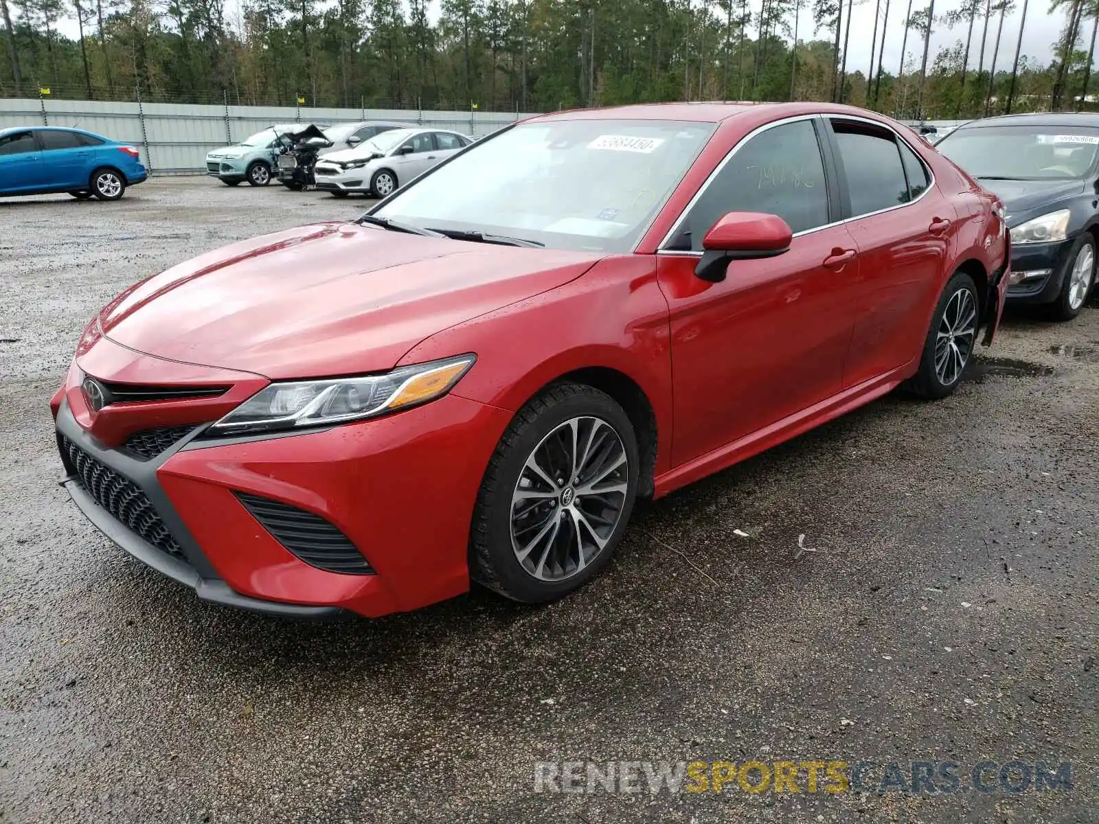 2 Photograph of a damaged car 4T1B11HK1KU216514 TOYOTA CAMRY 2019