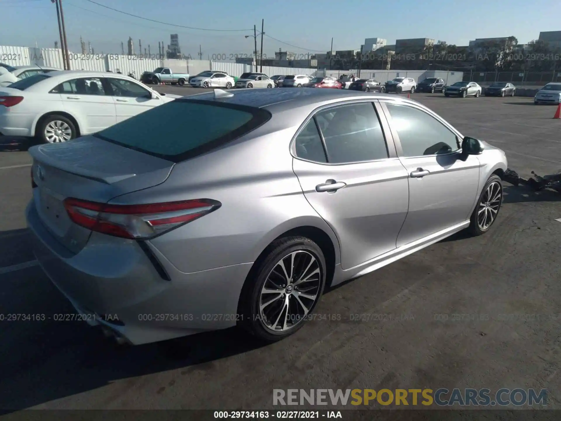 4 Photograph of a damaged car 4T1B11HK1KU217193 TOYOTA CAMRY 2019