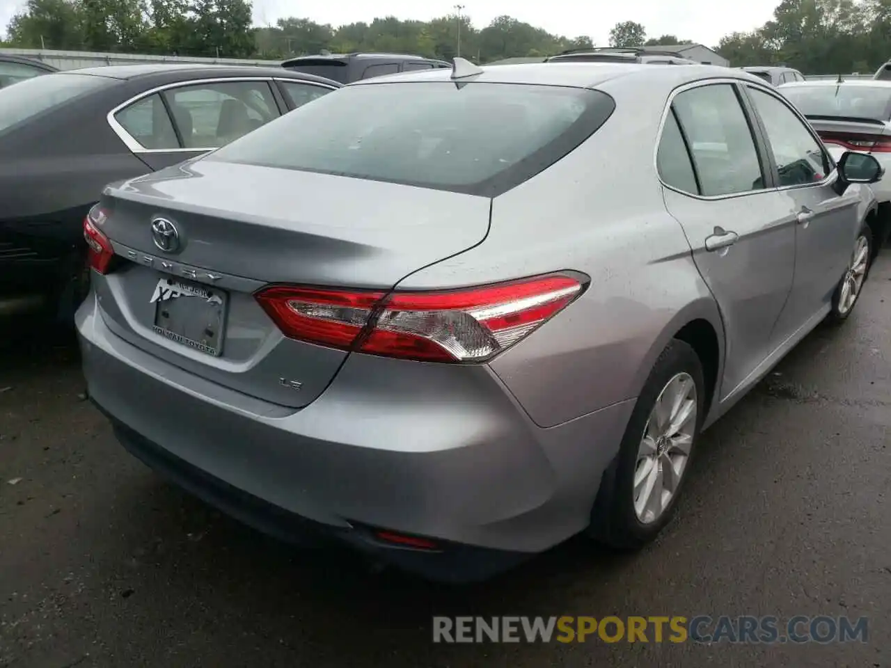 4 Photograph of a damaged car 4T1B11HK1KU217663 TOYOTA CAMRY 2019