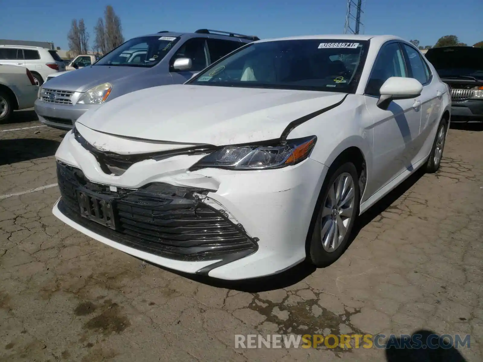 2 Photograph of a damaged car 4T1B11HK1KU217775 TOYOTA CAMRY 2019