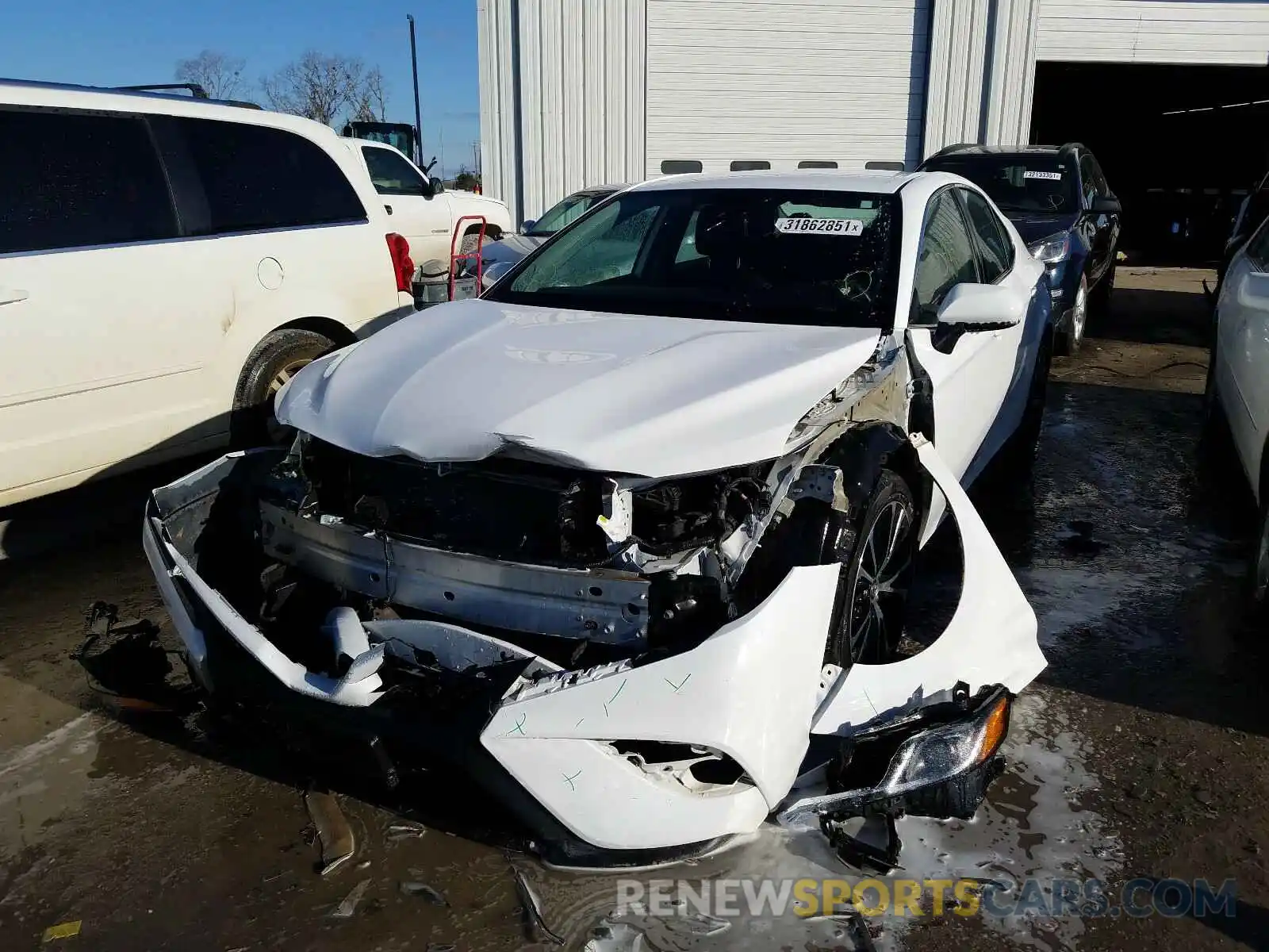 2 Photograph of a damaged car 4T1B11HK1KU218103 TOYOTA CAMRY 2019