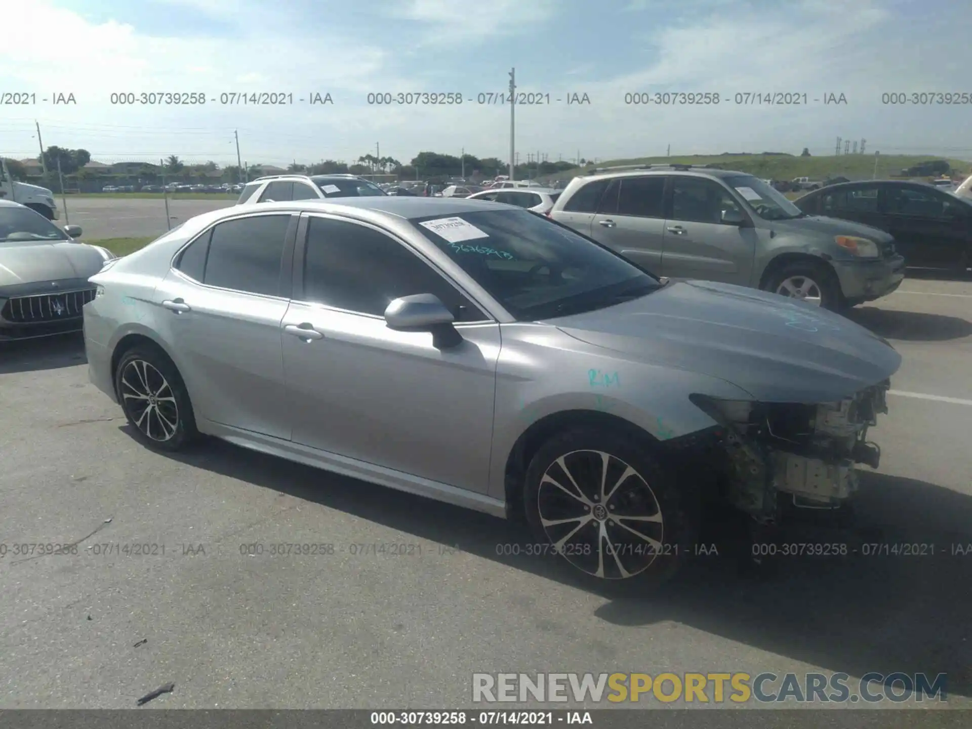 1 Photograph of a damaged car 4T1B11HK1KU218263 TOYOTA CAMRY 2019