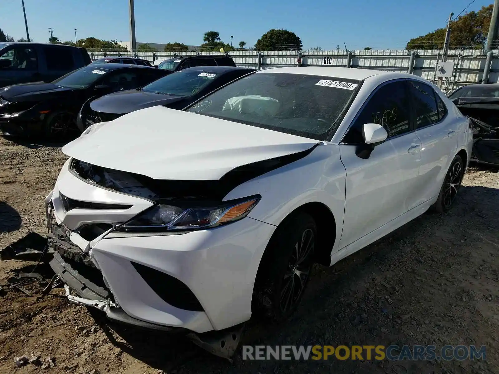 2 Photograph of a damaged car 4T1B11HK1KU218795 TOYOTA CAMRY 2019