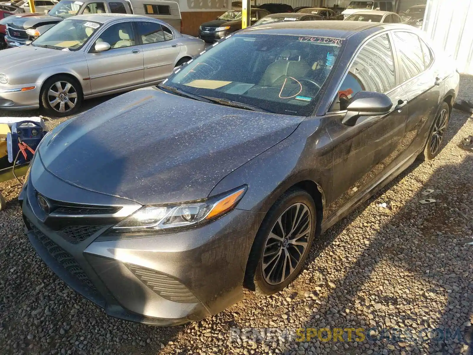 2 Photograph of a damaged car 4T1B11HK1KU219073 TOYOTA CAMRY 2019