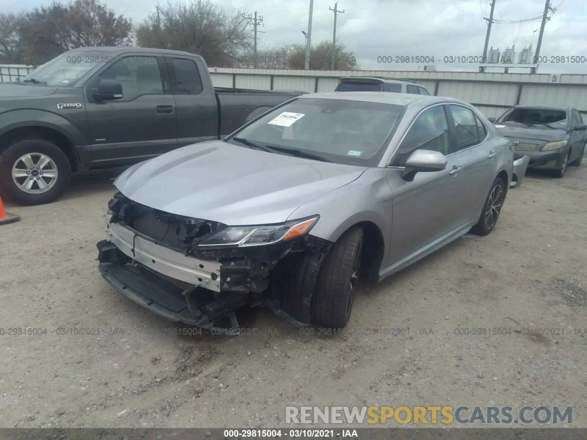 2 Photograph of a damaged car 4T1B11HK1KU219235 TOYOTA CAMRY 2019