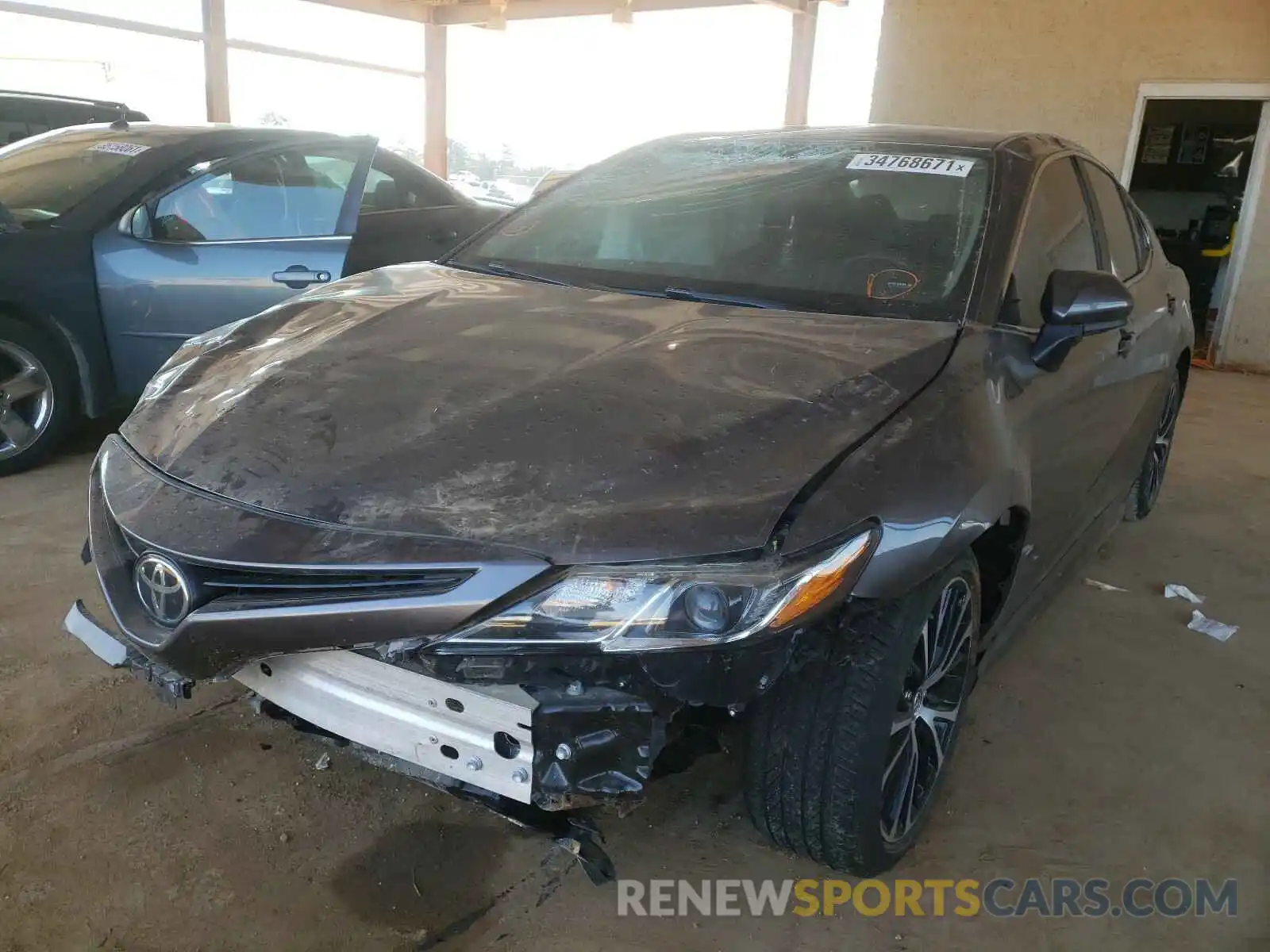 2 Photograph of a damaged car 4T1B11HK1KU220059 TOYOTA CAMRY 2019