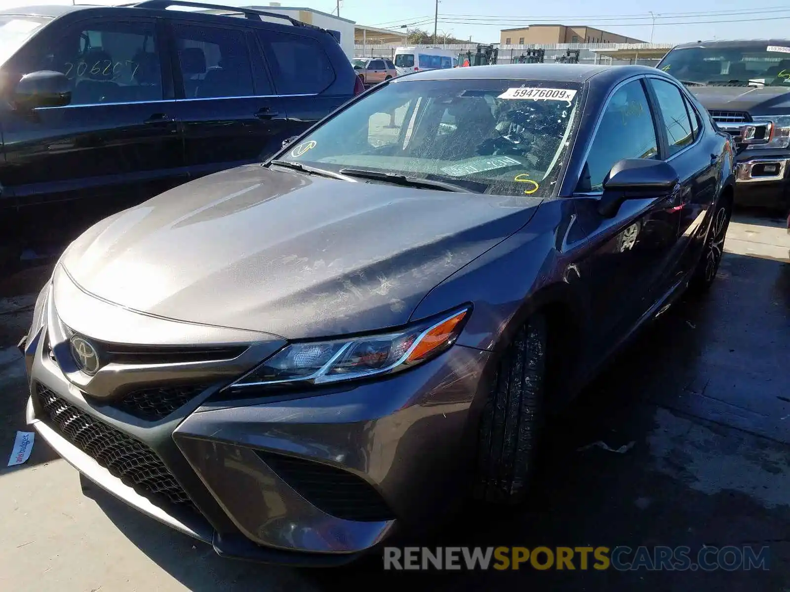 2 Photograph of a damaged car 4T1B11HK1KU220403 TOYOTA CAMRY 2019