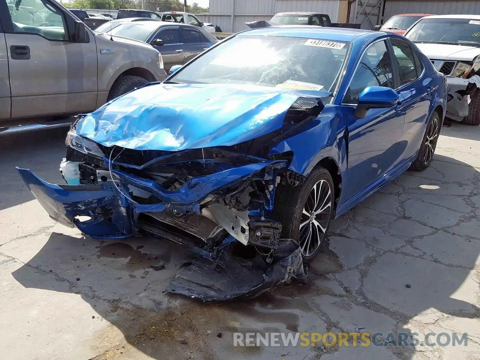 2 Photograph of a damaged car 4T1B11HK1KU220532 TOYOTA CAMRY 2019