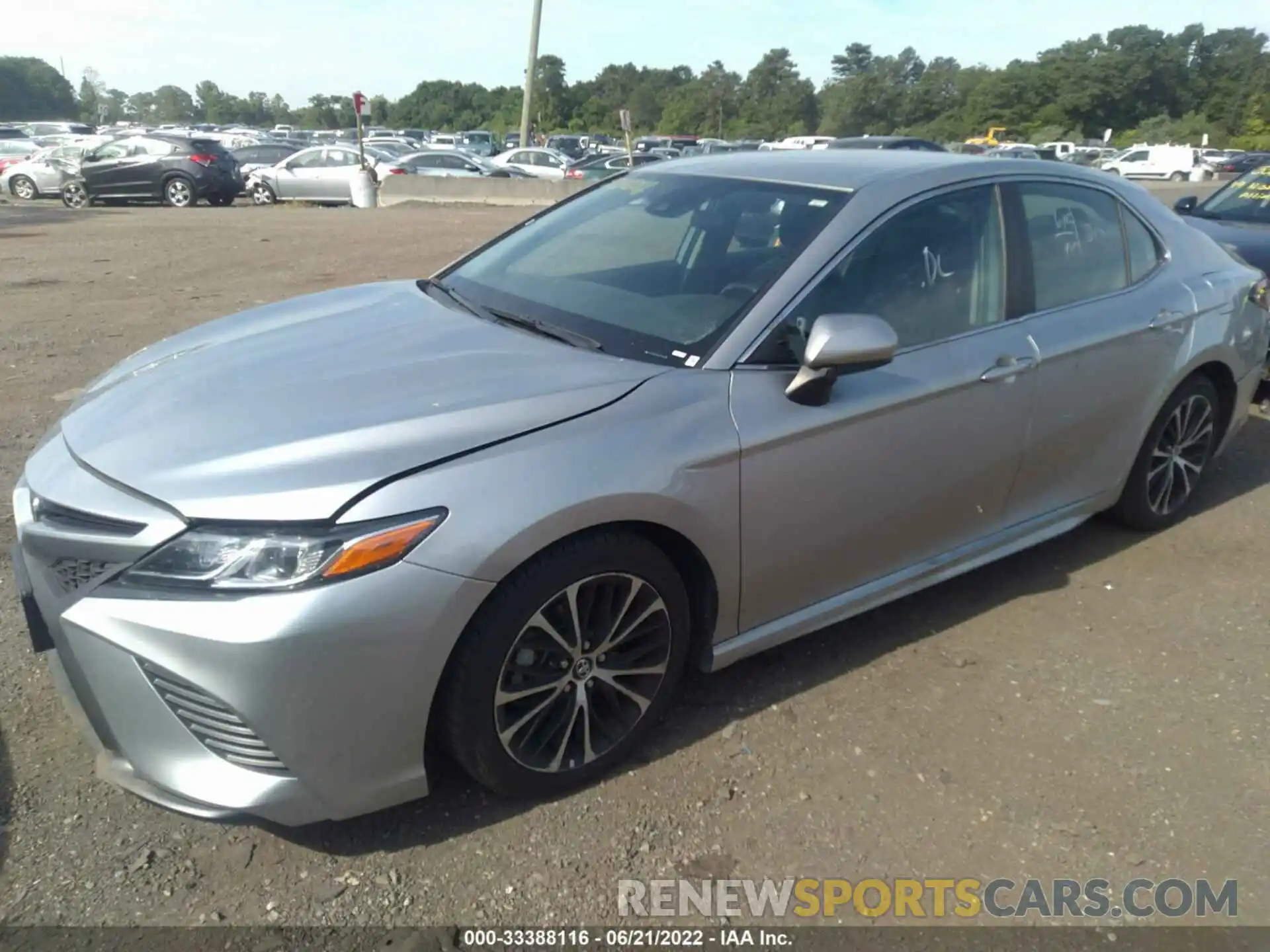 2 Photograph of a damaged car 4T1B11HK1KU221163 TOYOTA CAMRY 2019