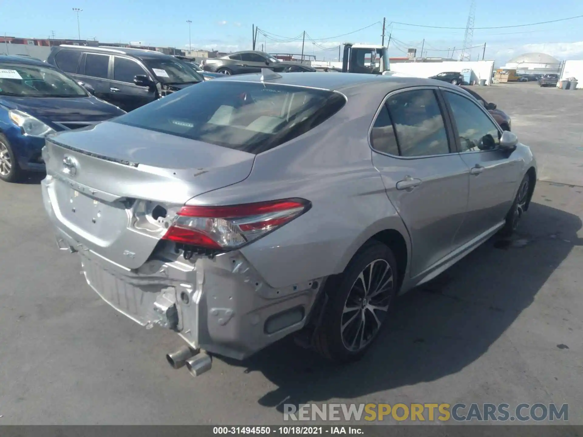 4 Photograph of a damaged car 4T1B11HK1KU222667 TOYOTA CAMRY 2019