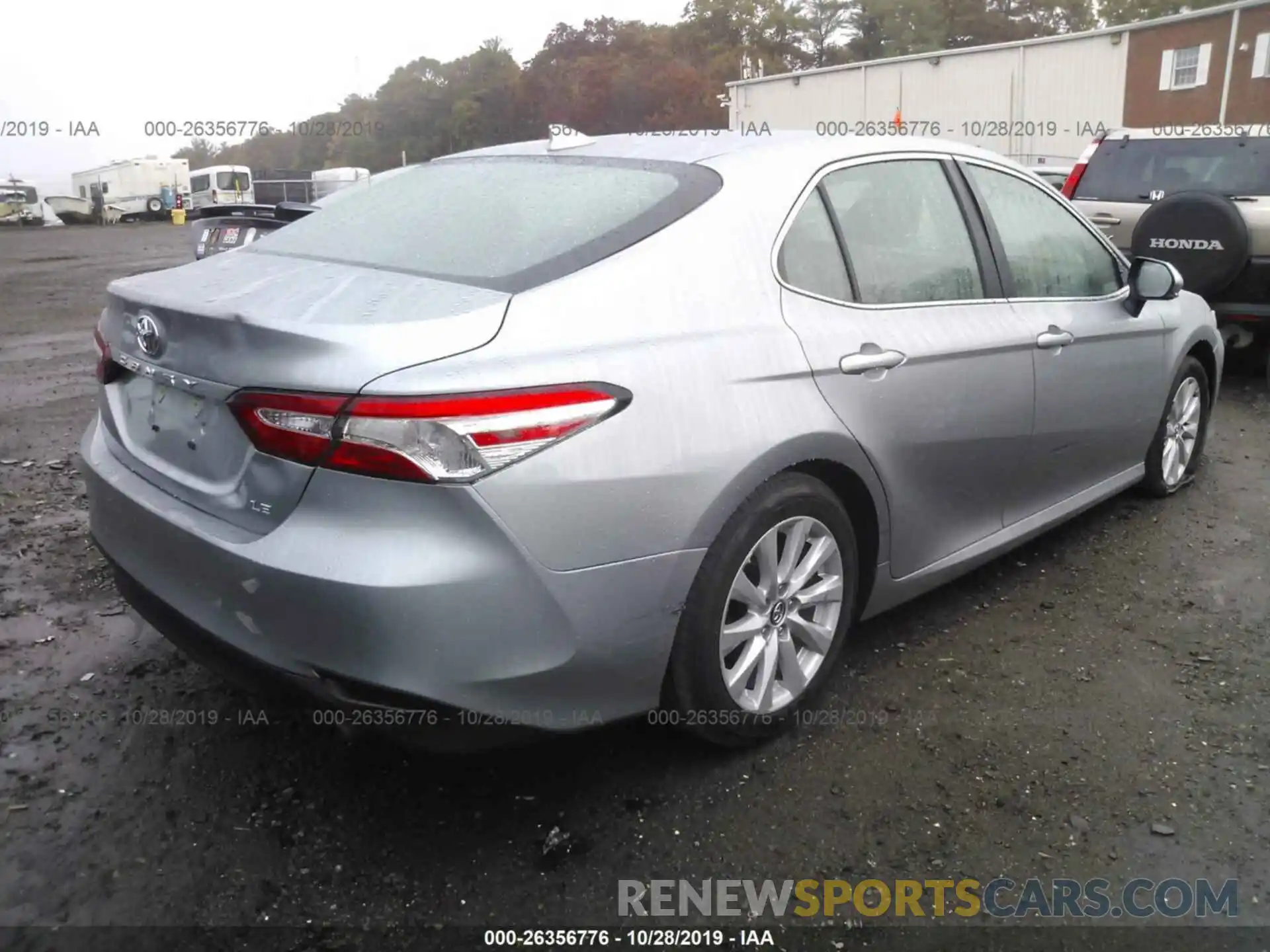 4 Photograph of a damaged car 4T1B11HK1KU227187 TOYOTA CAMRY 2019