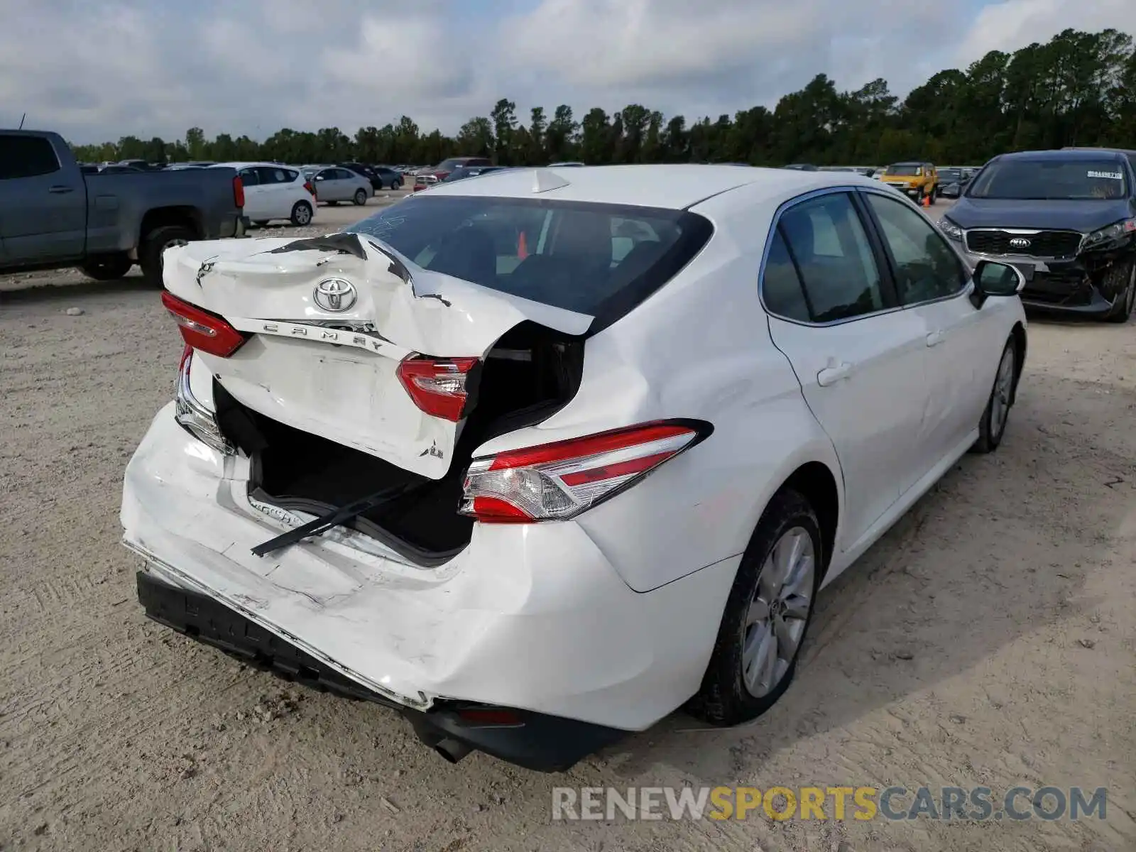 4 Photograph of a damaged car 4T1B11HK1KU227612 TOYOTA CAMRY 2019