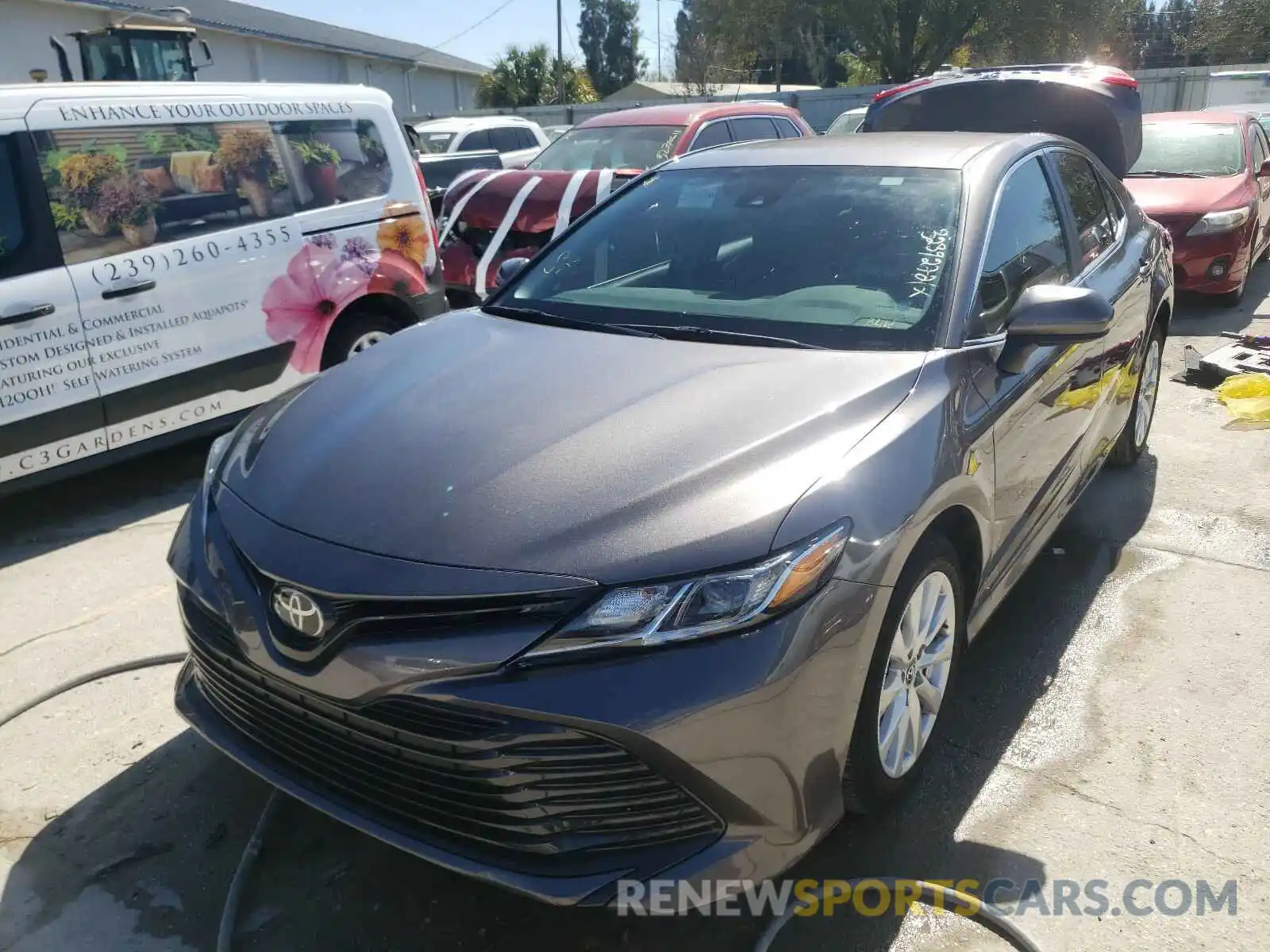 2 Photograph of a damaged car 4T1B11HK1KU228923 TOYOTA CAMRY 2019