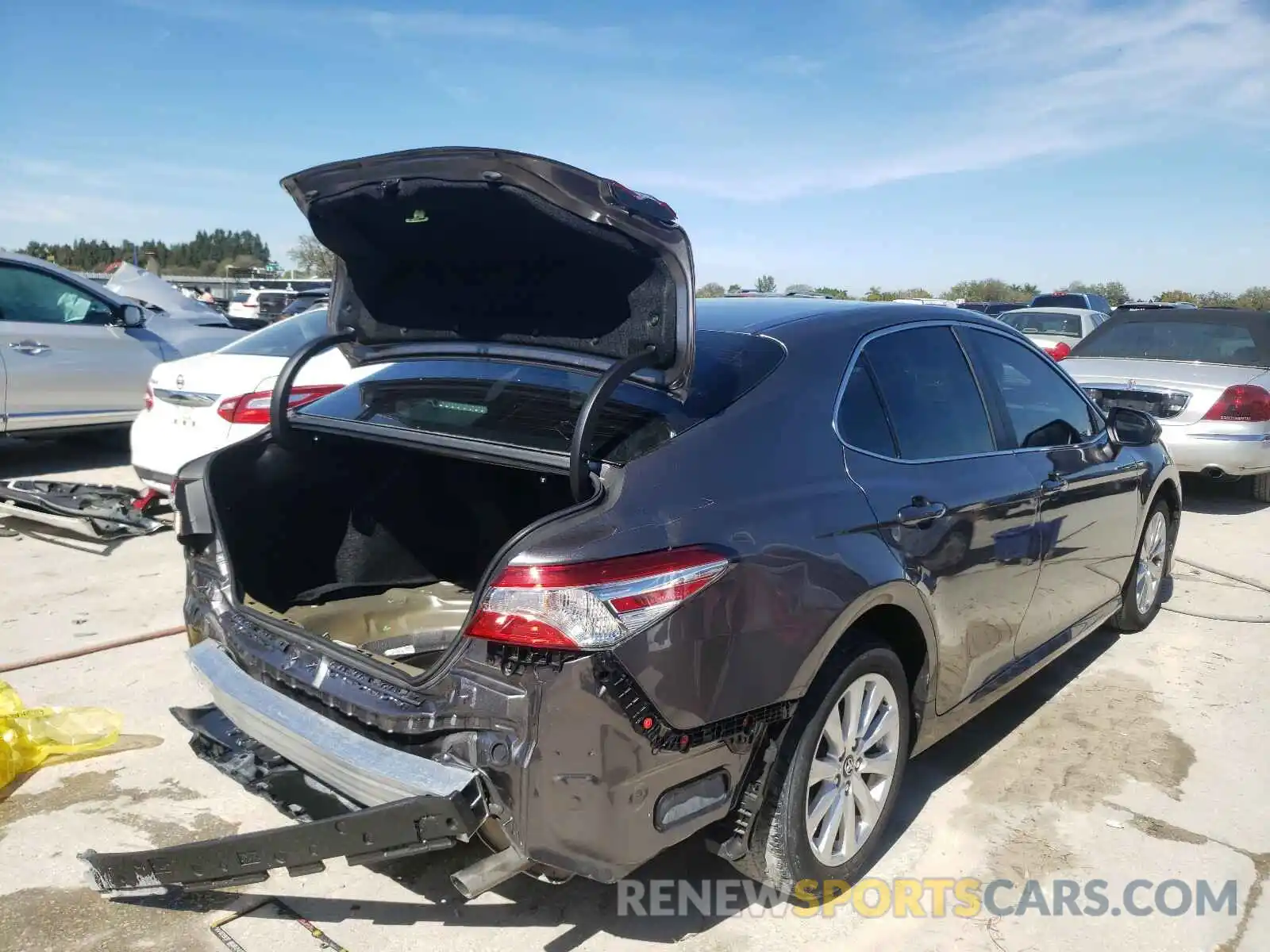 4 Photograph of a damaged car 4T1B11HK1KU228923 TOYOTA CAMRY 2019