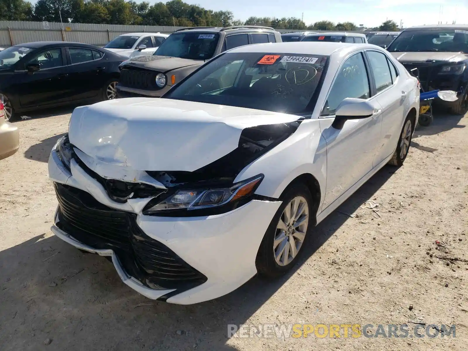 2 Photograph of a damaged car 4T1B11HK1KU229652 TOYOTA CAMRY 2019