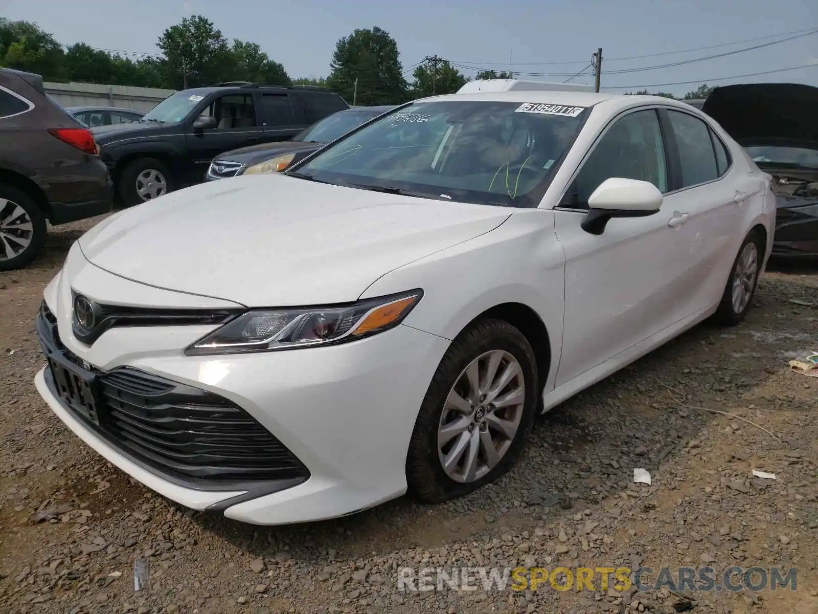 2 Photograph of a damaged car 4T1B11HK1KU229957 TOYOTA CAMRY 2019