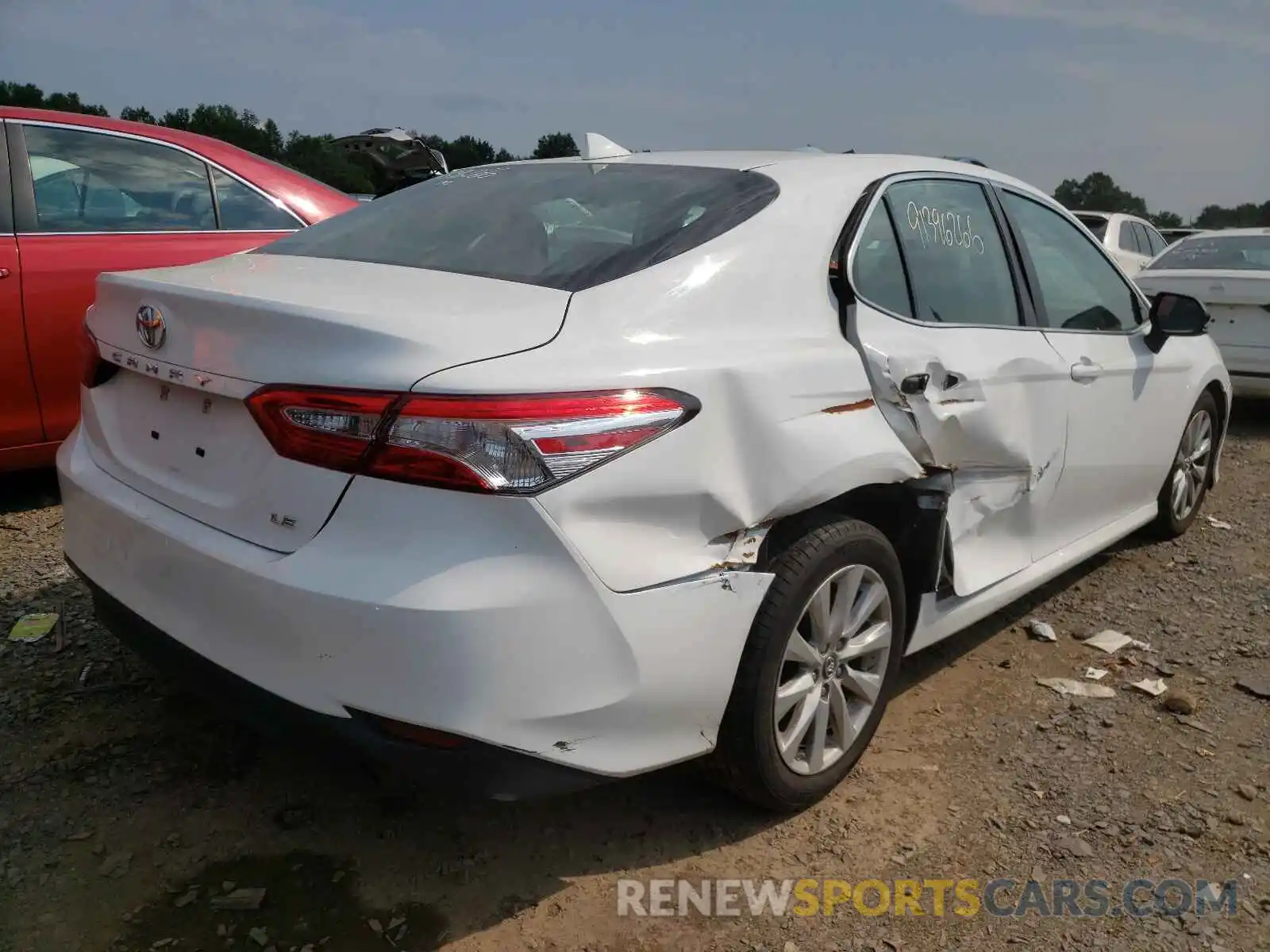 4 Photograph of a damaged car 4T1B11HK1KU229957 TOYOTA CAMRY 2019