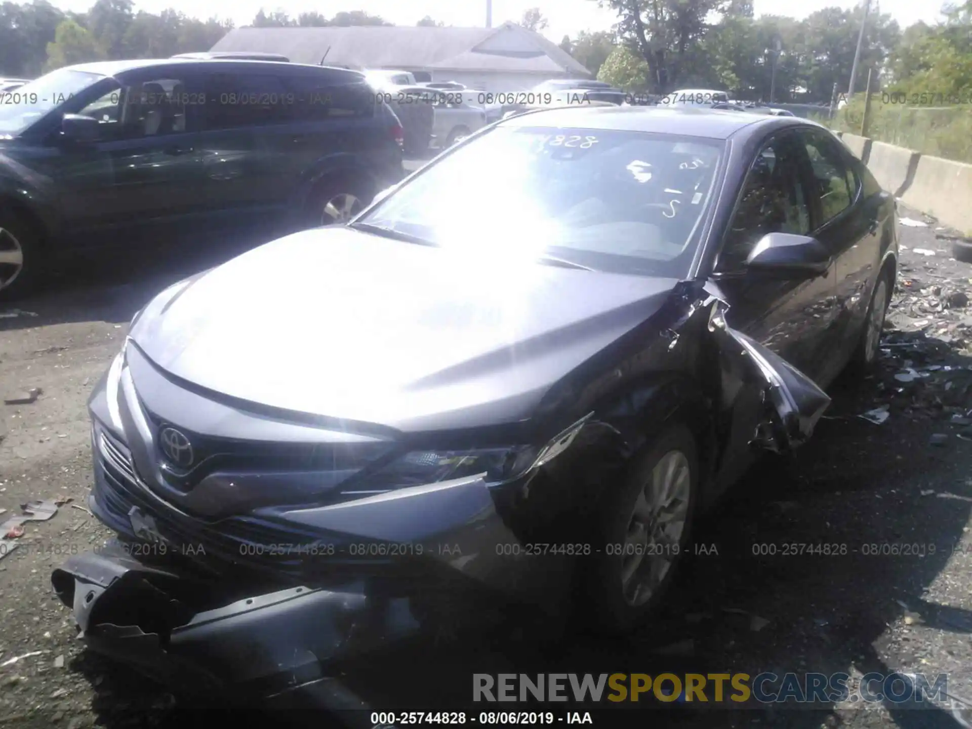 2 Photograph of a damaged car 4T1B11HK1KU230283 TOYOTA CAMRY 2019