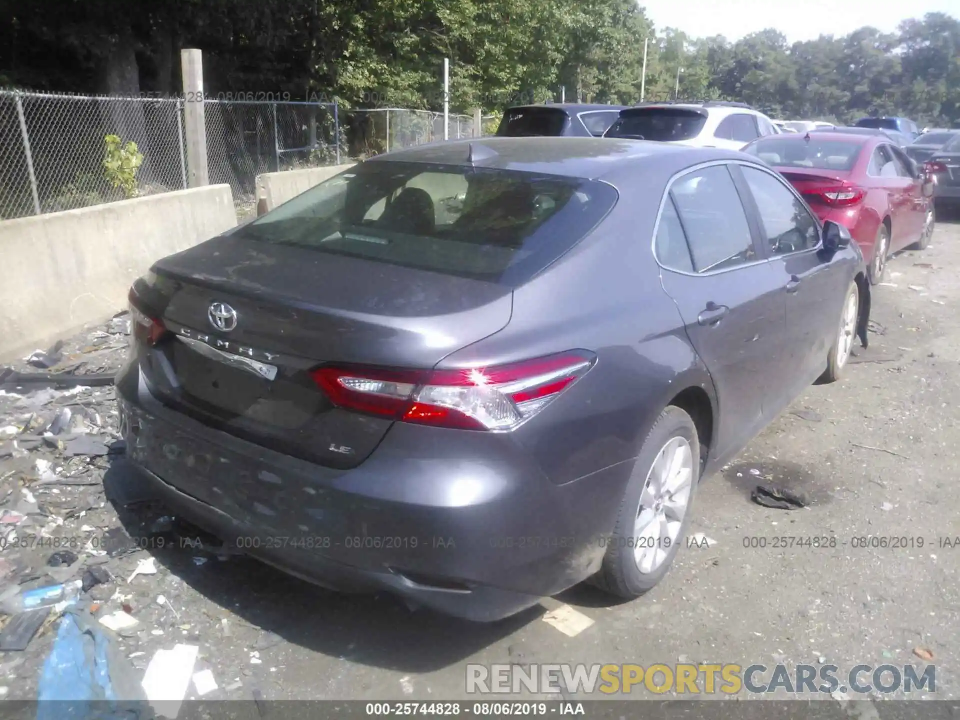 4 Photograph of a damaged car 4T1B11HK1KU230283 TOYOTA CAMRY 2019