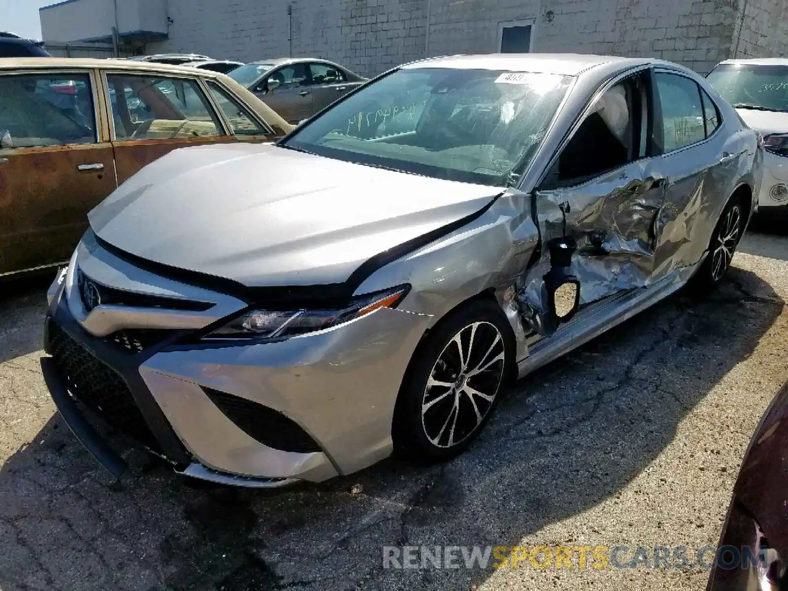 2 Photograph of a damaged car 4T1B11HK1KU233992 TOYOTA CAMRY 2019