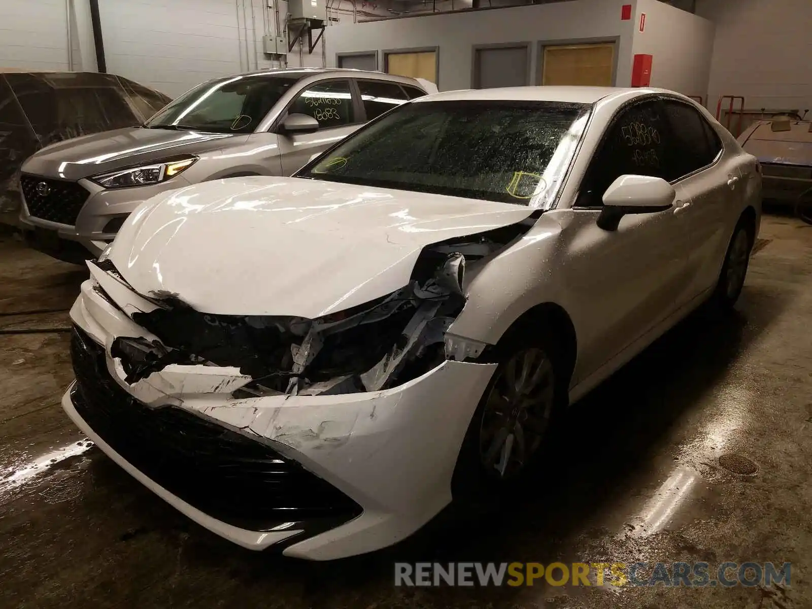 2 Photograph of a damaged car 4T1B11HK1KU238271 TOYOTA CAMRY 2019