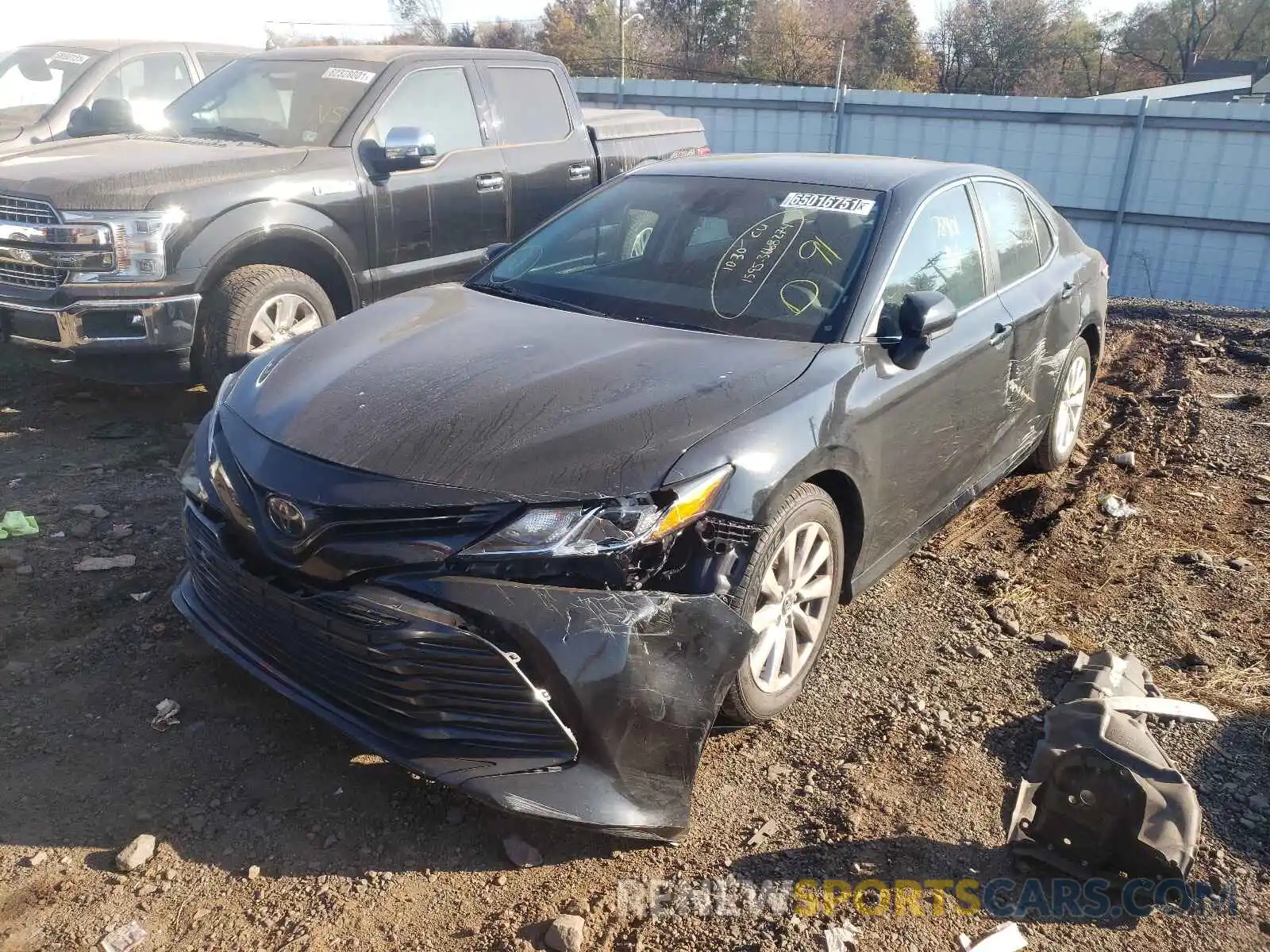 2 Photograph of a damaged car 4T1B11HK1KU238349 TOYOTA CAMRY 2019