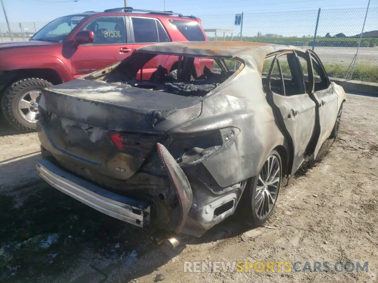 4 Photograph of a damaged car 4T1B11HK1KU239209 TOYOTA CAMRY 2019