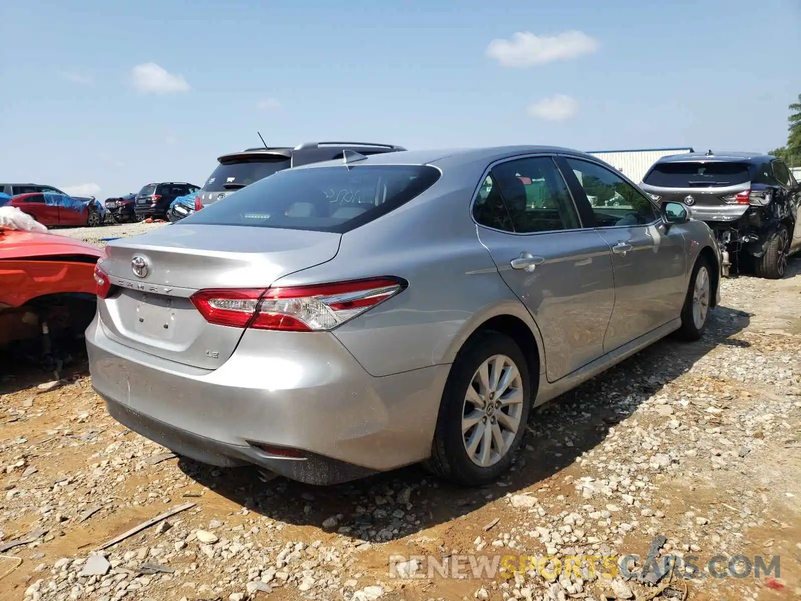 4 Photograph of a damaged car 4T1B11HK1KU239520 TOYOTA CAMRY 2019