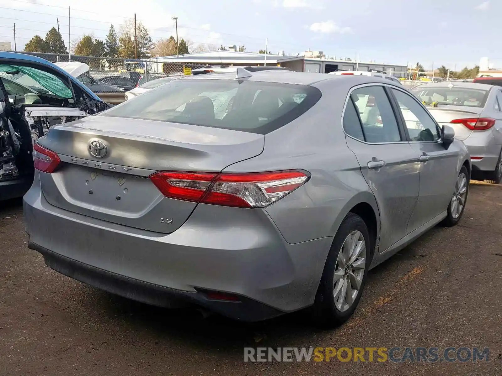 4 Photograph of a damaged car 4T1B11HK1KU241428 TOYOTA CAMRY 2019