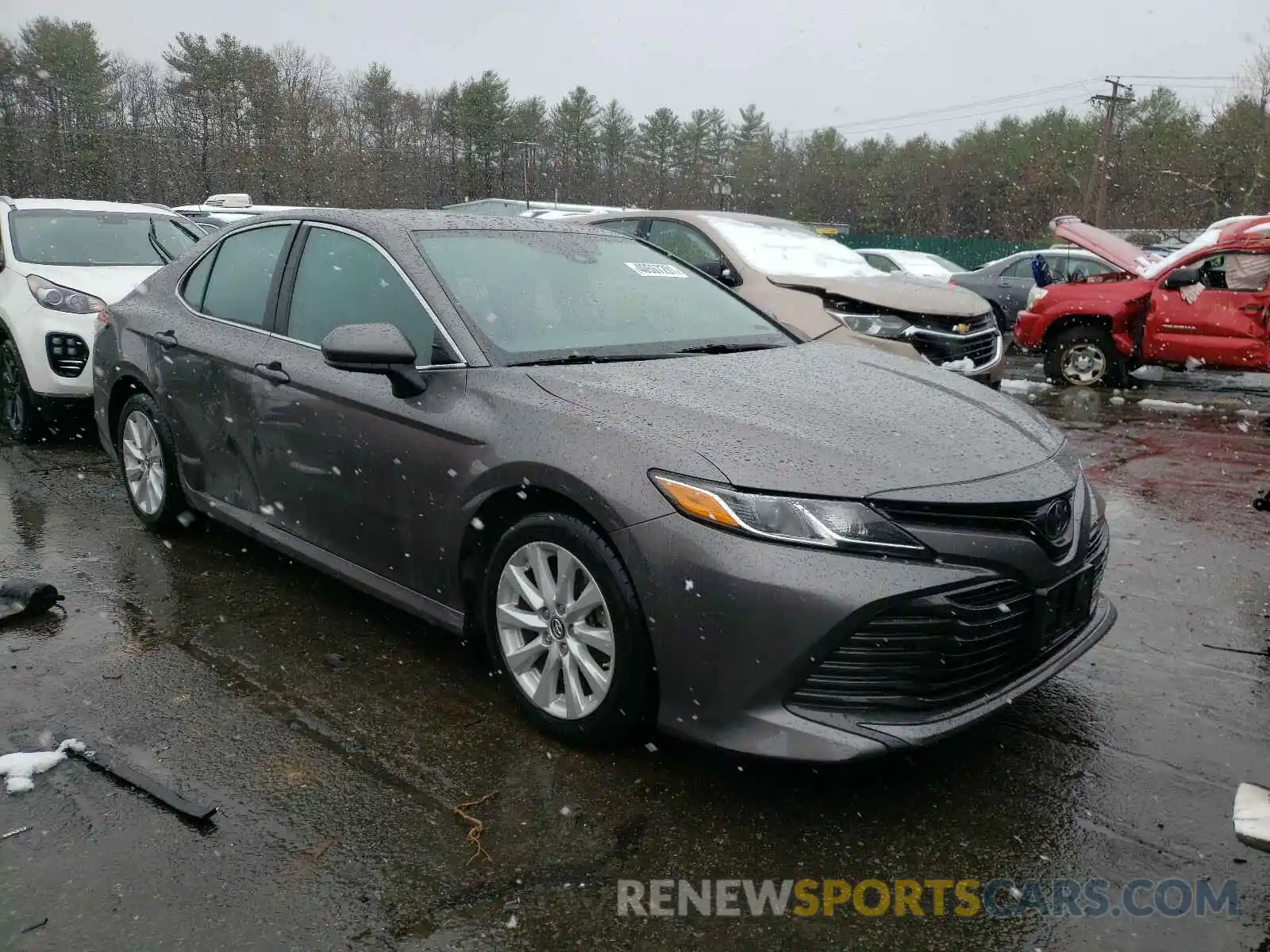 1 Photograph of a damaged car 4T1B11HK1KU242031 TOYOTA CAMRY 2019