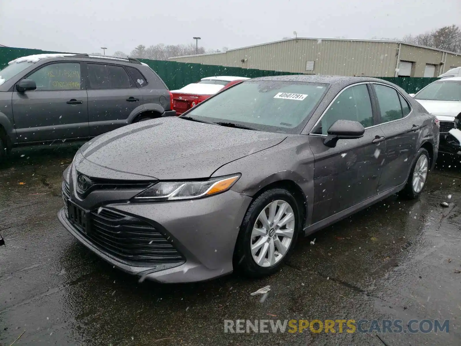 2 Photograph of a damaged car 4T1B11HK1KU242031 TOYOTA CAMRY 2019