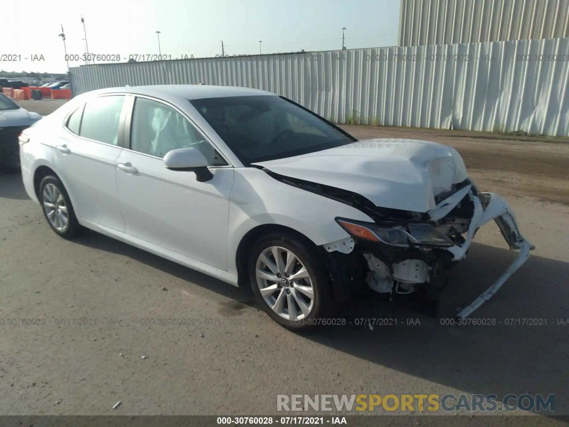 1 Photograph of a damaged car 4T1B11HK1KU242174 TOYOTA CAMRY 2019