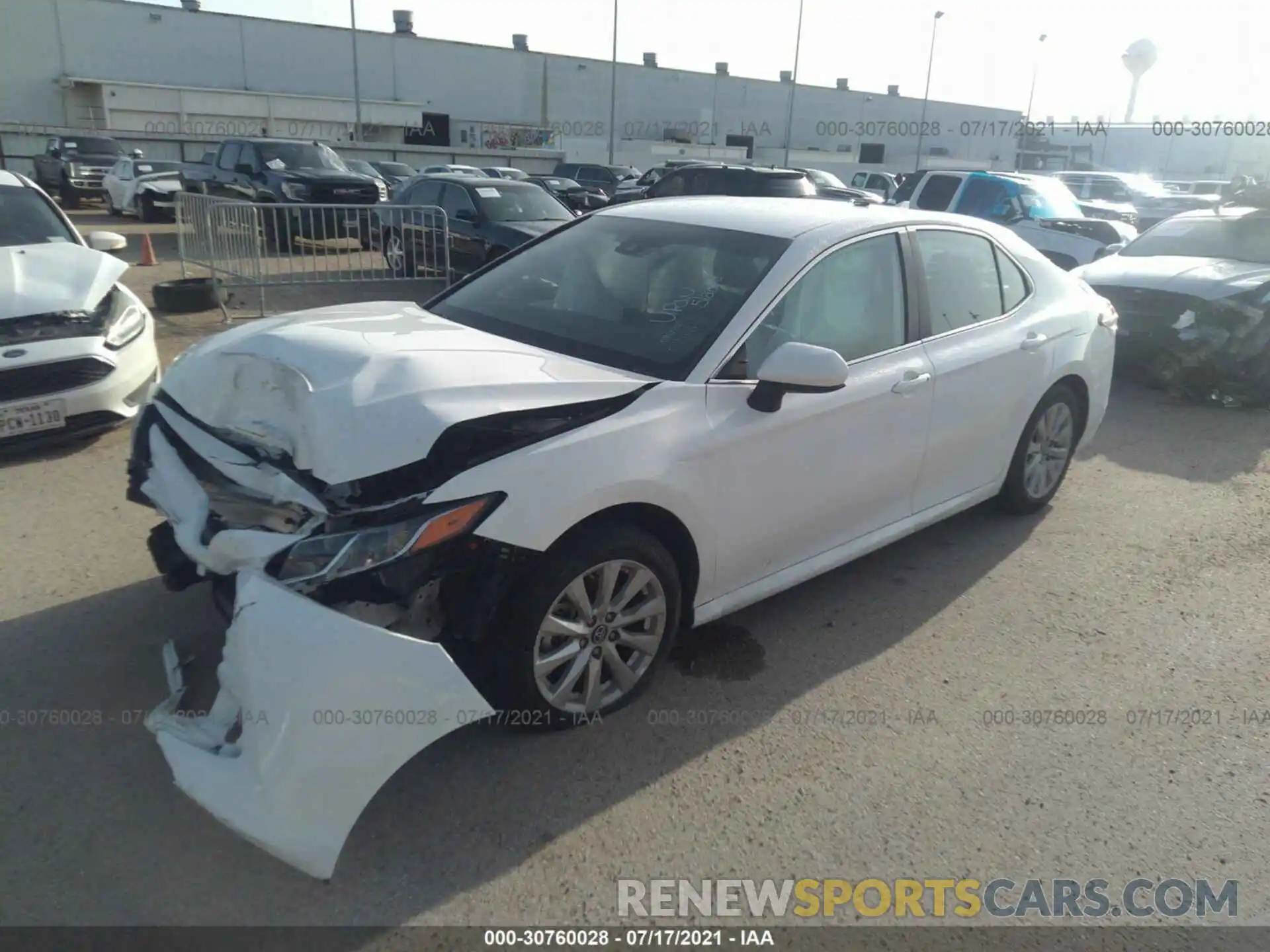 2 Photograph of a damaged car 4T1B11HK1KU242174 TOYOTA CAMRY 2019