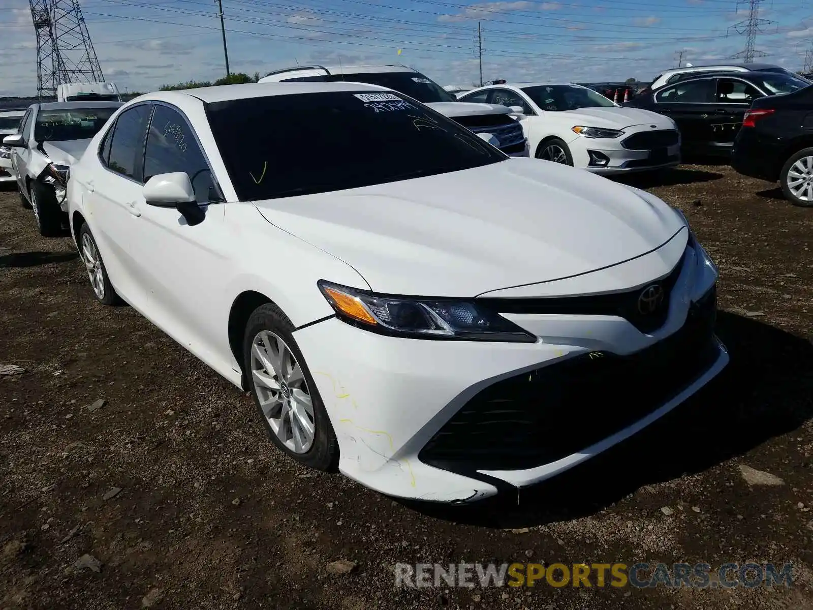 1 Photograph of a damaged car 4T1B11HK1KU242899 TOYOTA CAMRY 2019