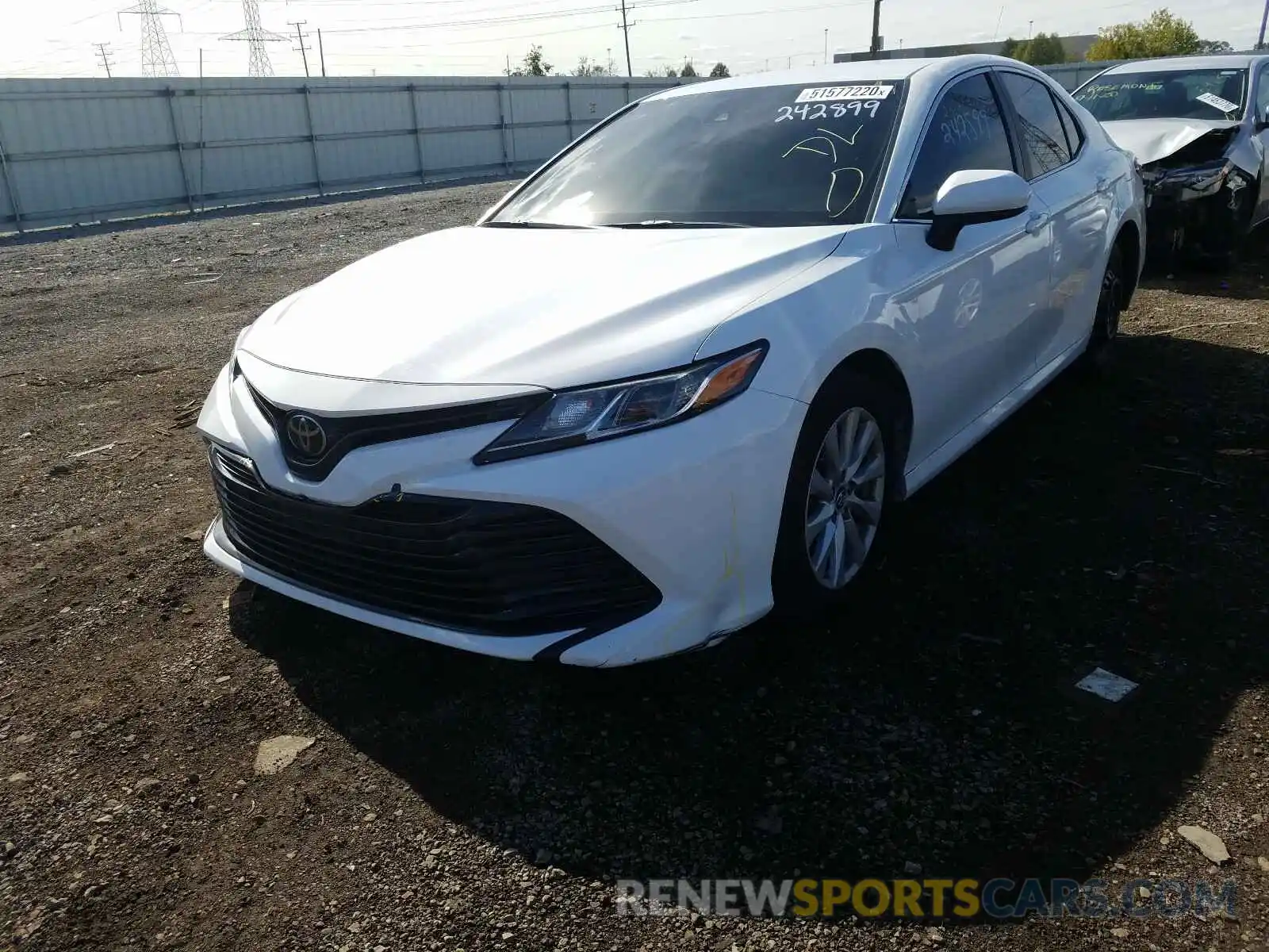 2 Photograph of a damaged car 4T1B11HK1KU242899 TOYOTA CAMRY 2019