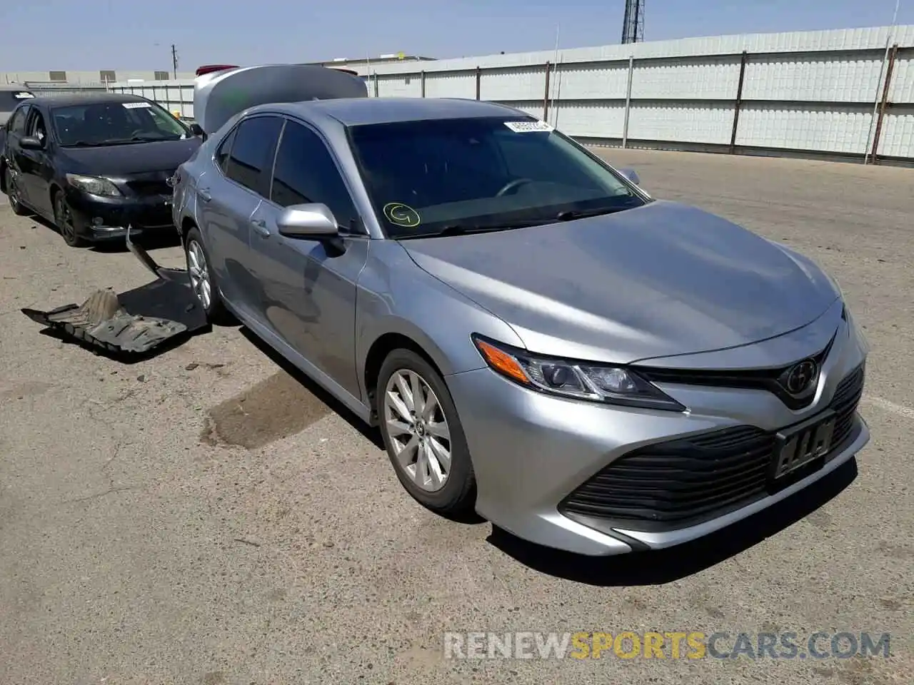 1 Photograph of a damaged car 4T1B11HK1KU242904 TOYOTA CAMRY 2019