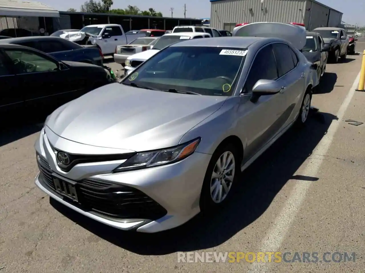 2 Photograph of a damaged car 4T1B11HK1KU242904 TOYOTA CAMRY 2019