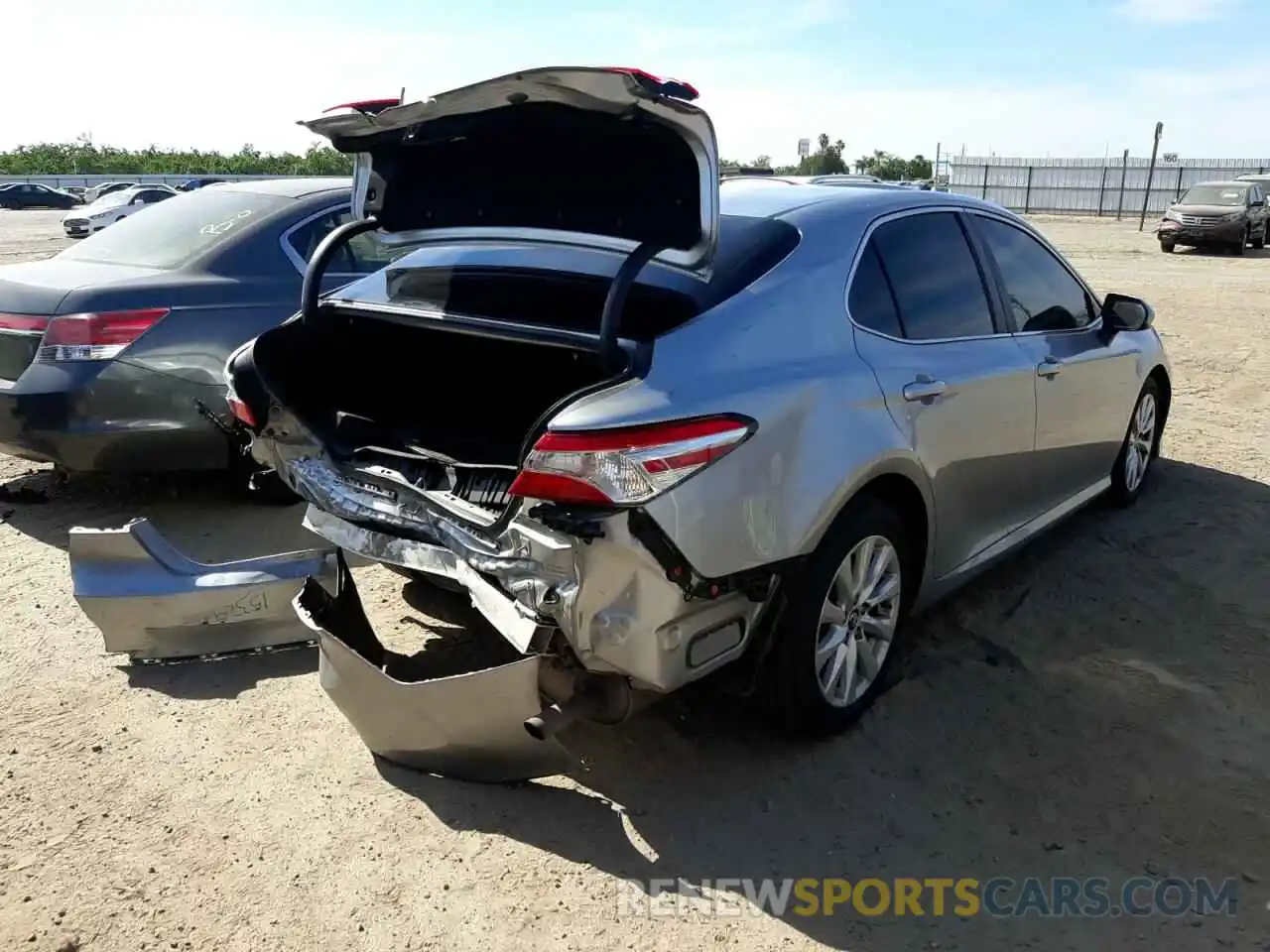 4 Photograph of a damaged car 4T1B11HK1KU242904 TOYOTA CAMRY 2019