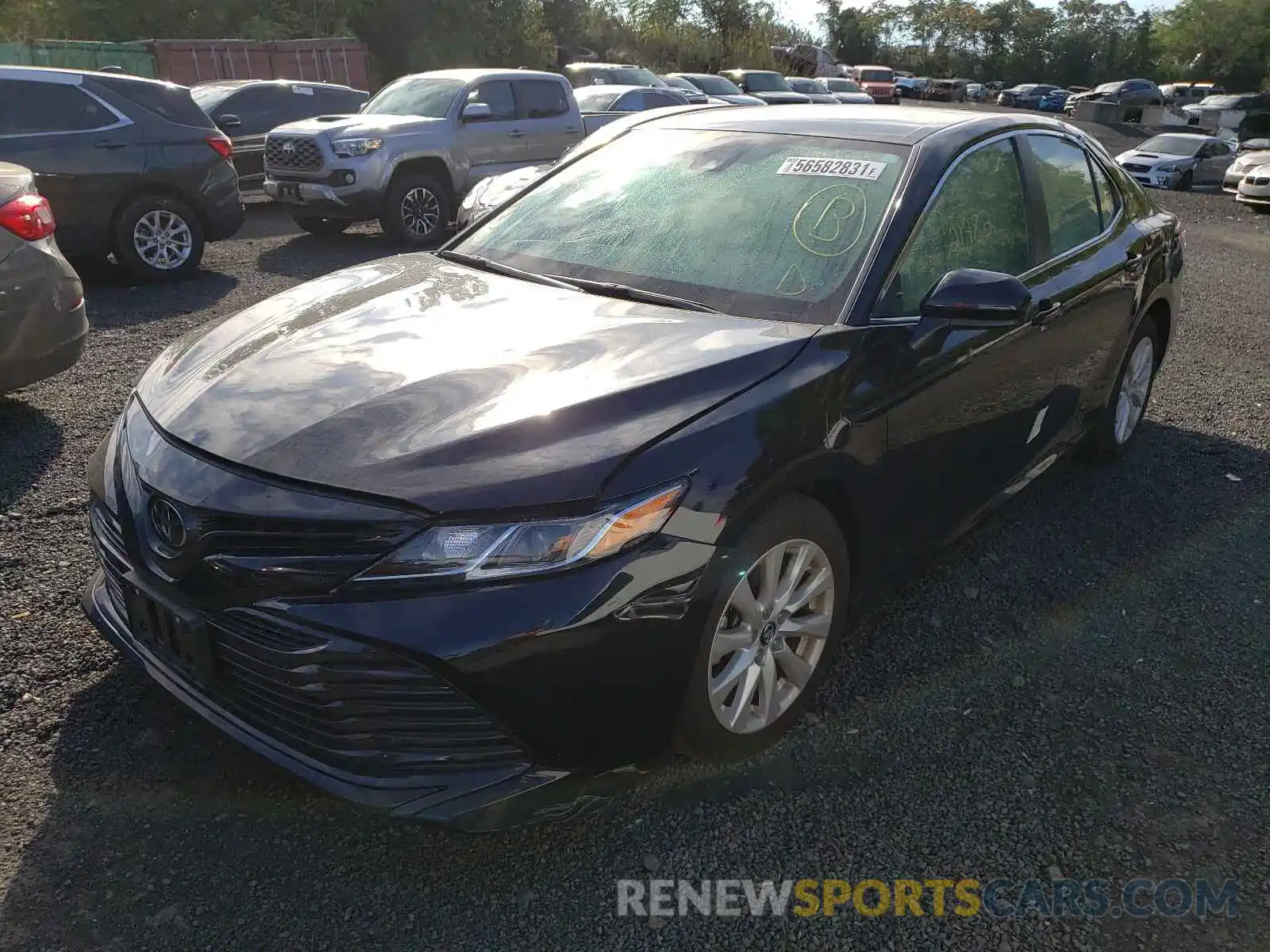 2 Photograph of a damaged car 4T1B11HK1KU244748 TOYOTA CAMRY 2019