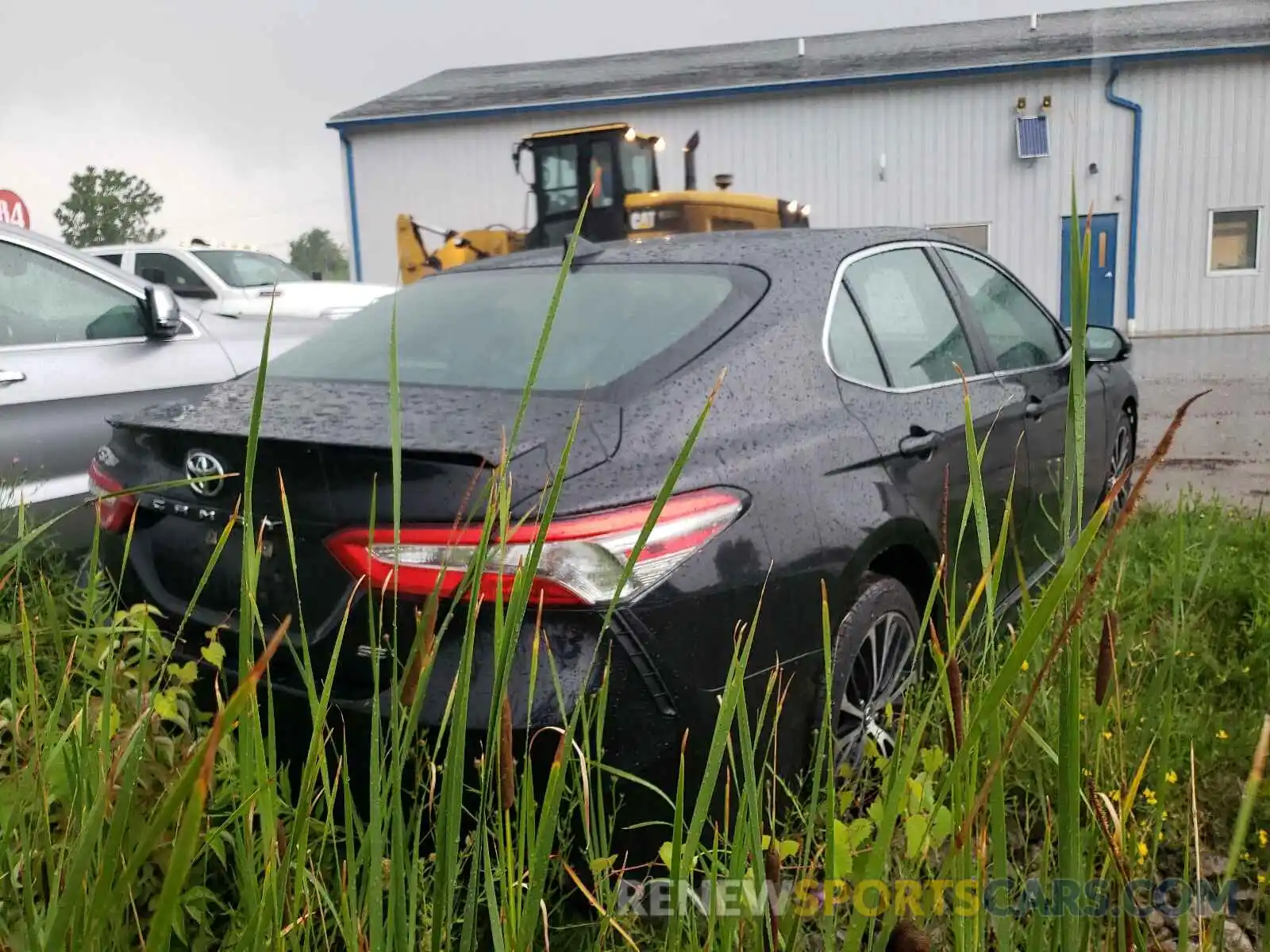 4 Photograph of a damaged car 4T1B11HK1KU245608 TOYOTA CAMRY 2019