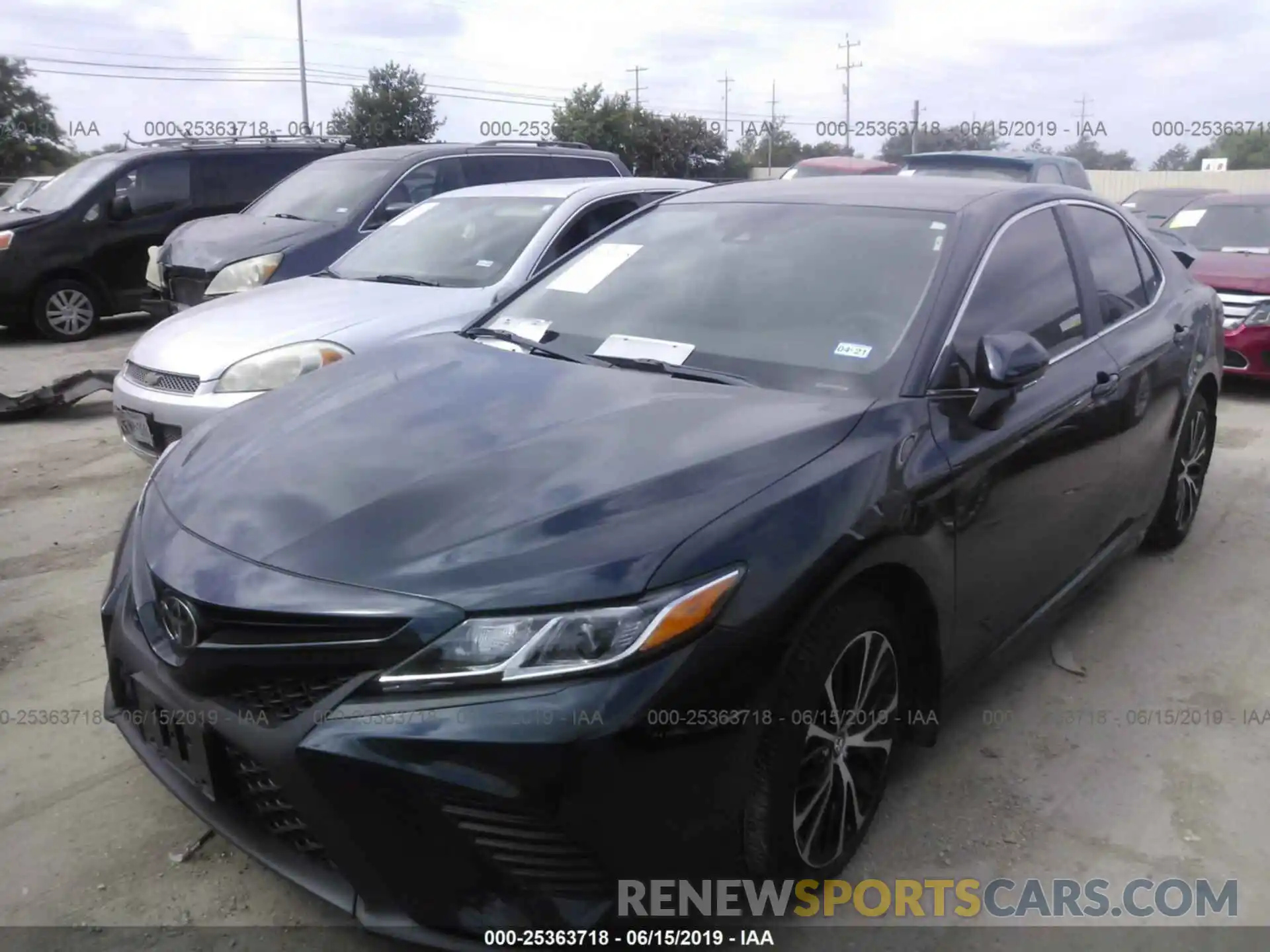 2 Photograph of a damaged car 4T1B11HK1KU247147 TOYOTA CAMRY 2019