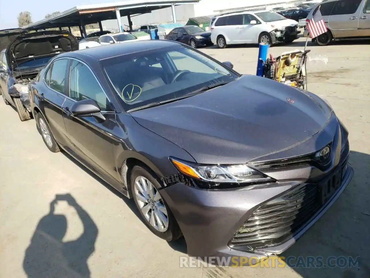 1 Photograph of a damaged car 4T1B11HK1KU254938 TOYOTA CAMRY 2019