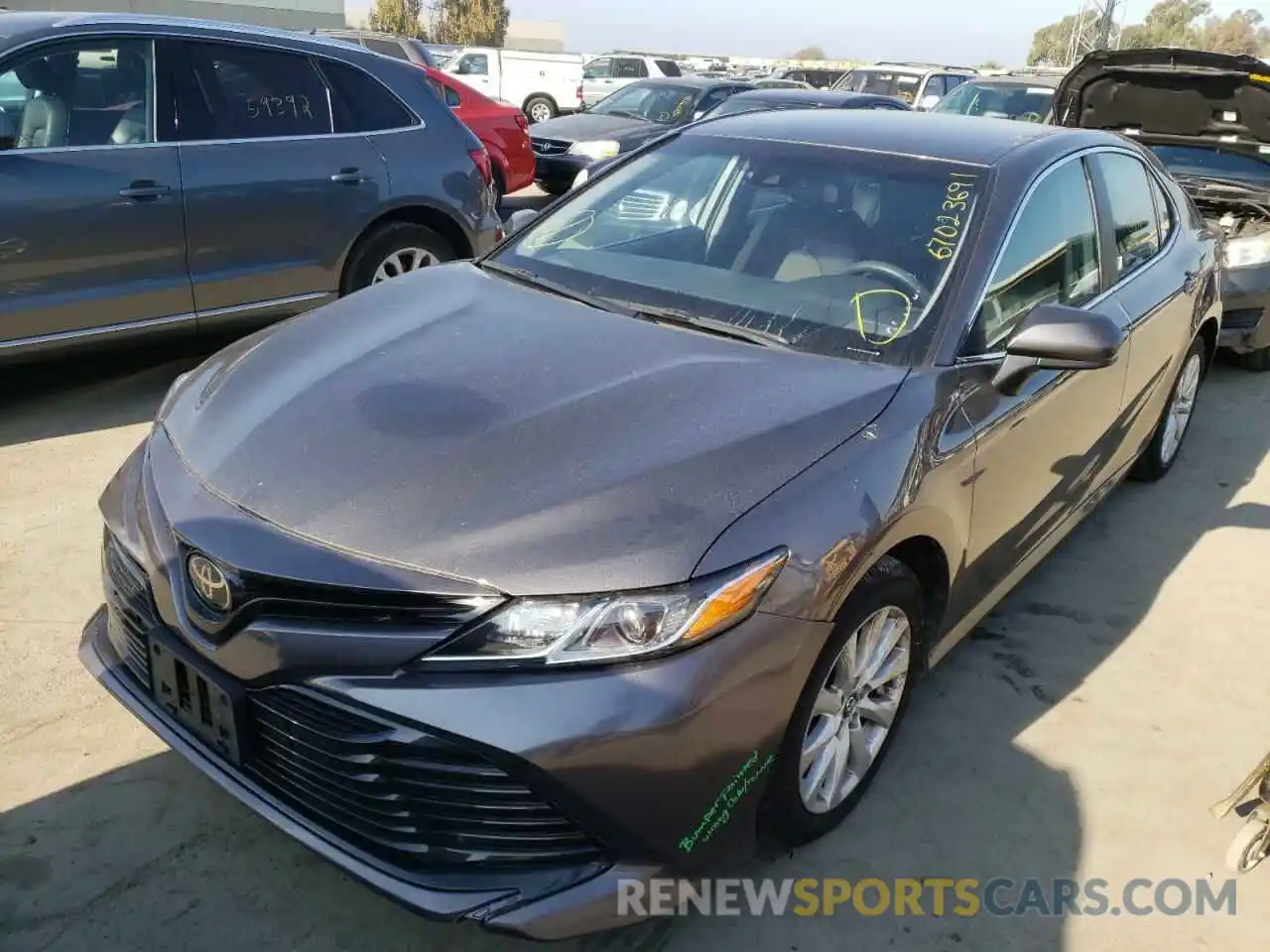 2 Photograph of a damaged car 4T1B11HK1KU254938 TOYOTA CAMRY 2019